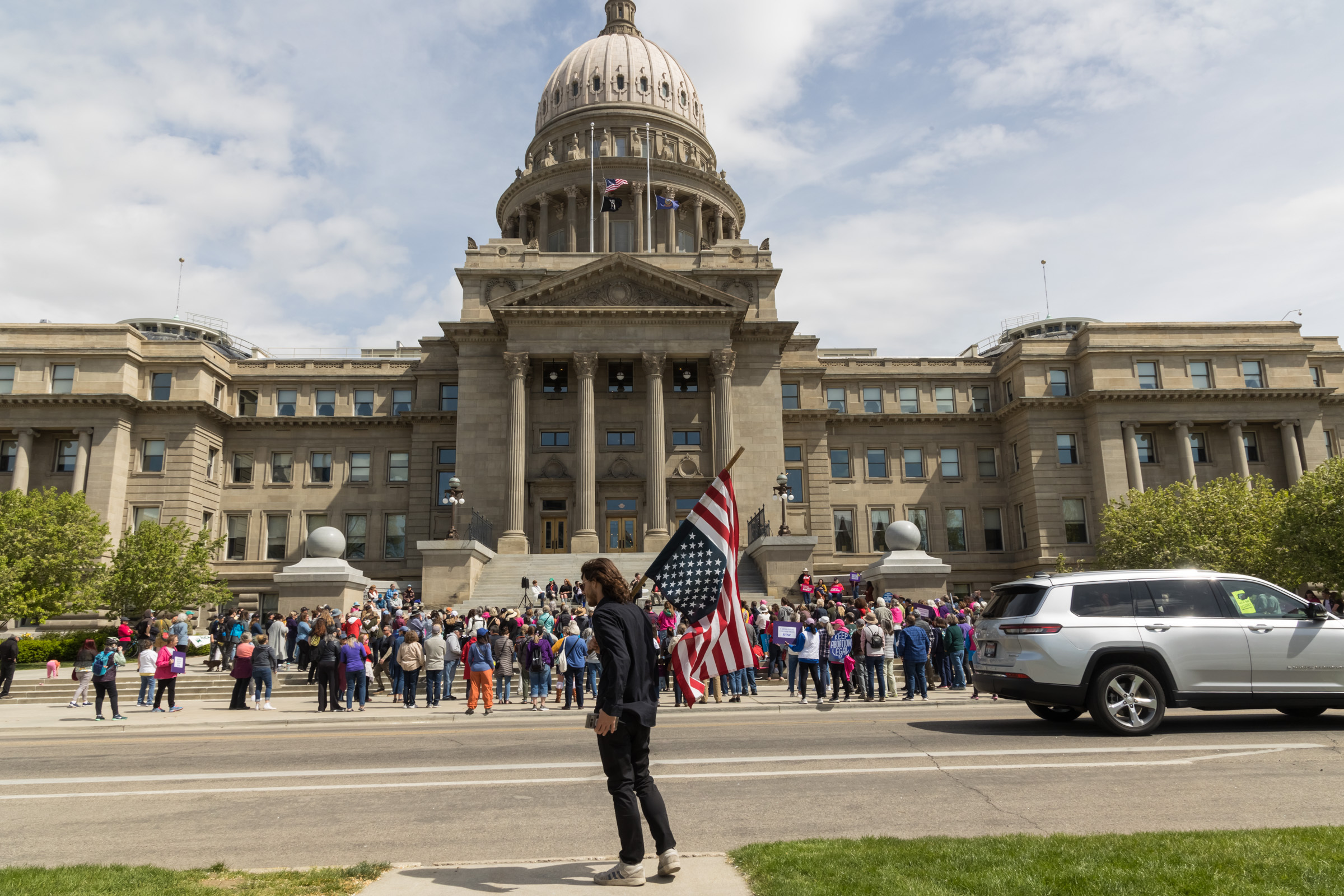 An upside down flag at a Planned Parenthood rally about the EMTALA case in Boise, Idaho on April 21, 2024. (Otto Kitsinger/Idaho Capital Sun)