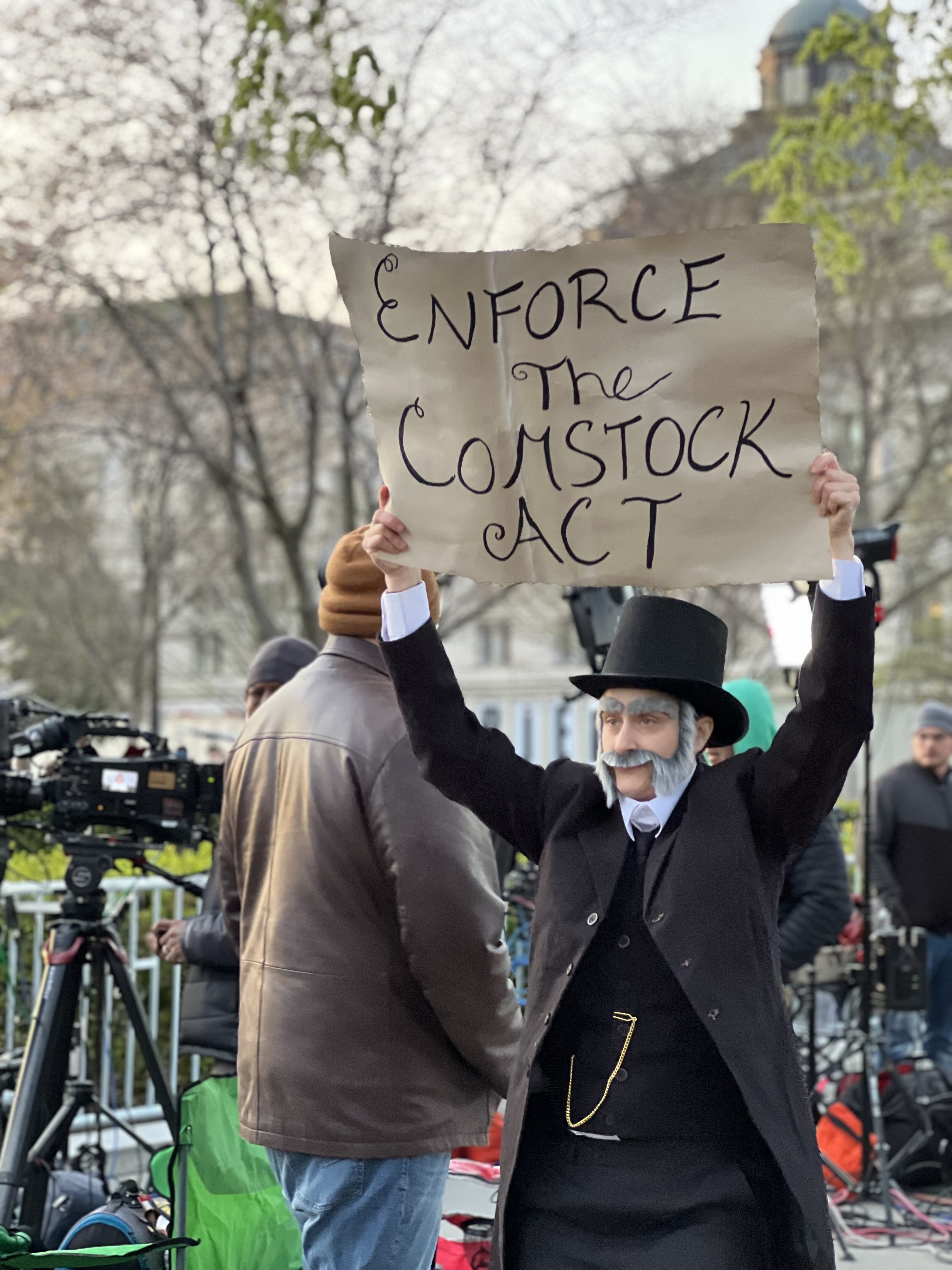 Molly Gaebe, a performer and activist with Abortion Access Front, dressed like 19th century anti-vice crusader Anthony Comstock, in front of the U.S. Supreme Court the day of oral arguments in the abortion-pill case, March 26, 2024. (Sofia Resnick/States Newsroom)