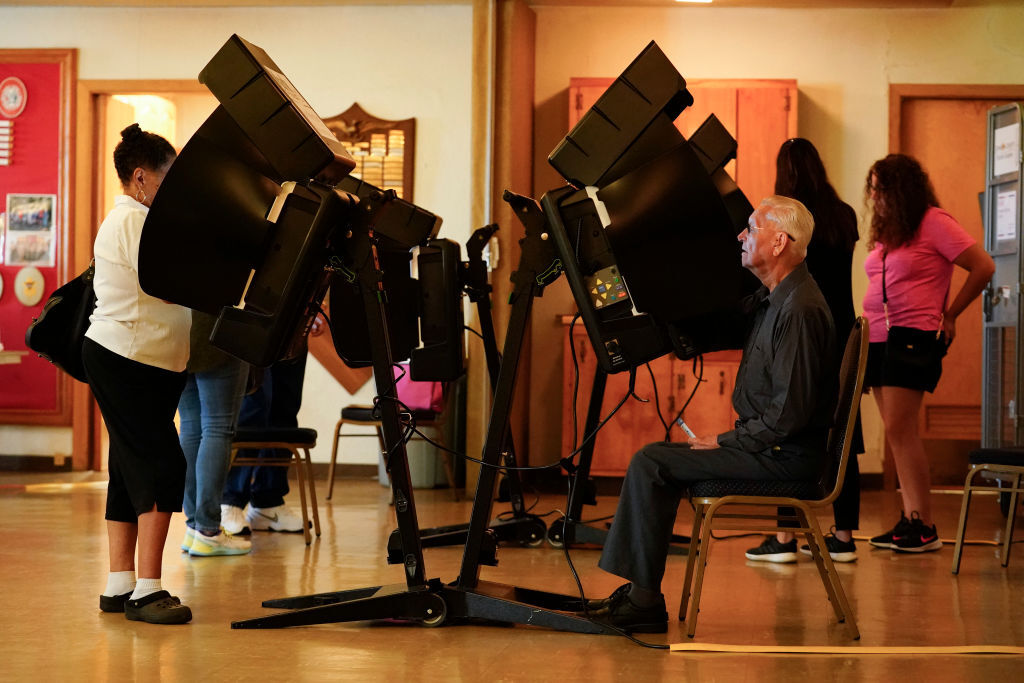 Voters cast their ballots in the Kansas Primary Election at Merriam Christian Church on Aug. 2, 2022, in Merriam, Kansas. Kansas voters were deciding whether to remove protection for abortion from the state’s Constitution. They voted to retain the protection. (Kyle Rivas/Getty Images)