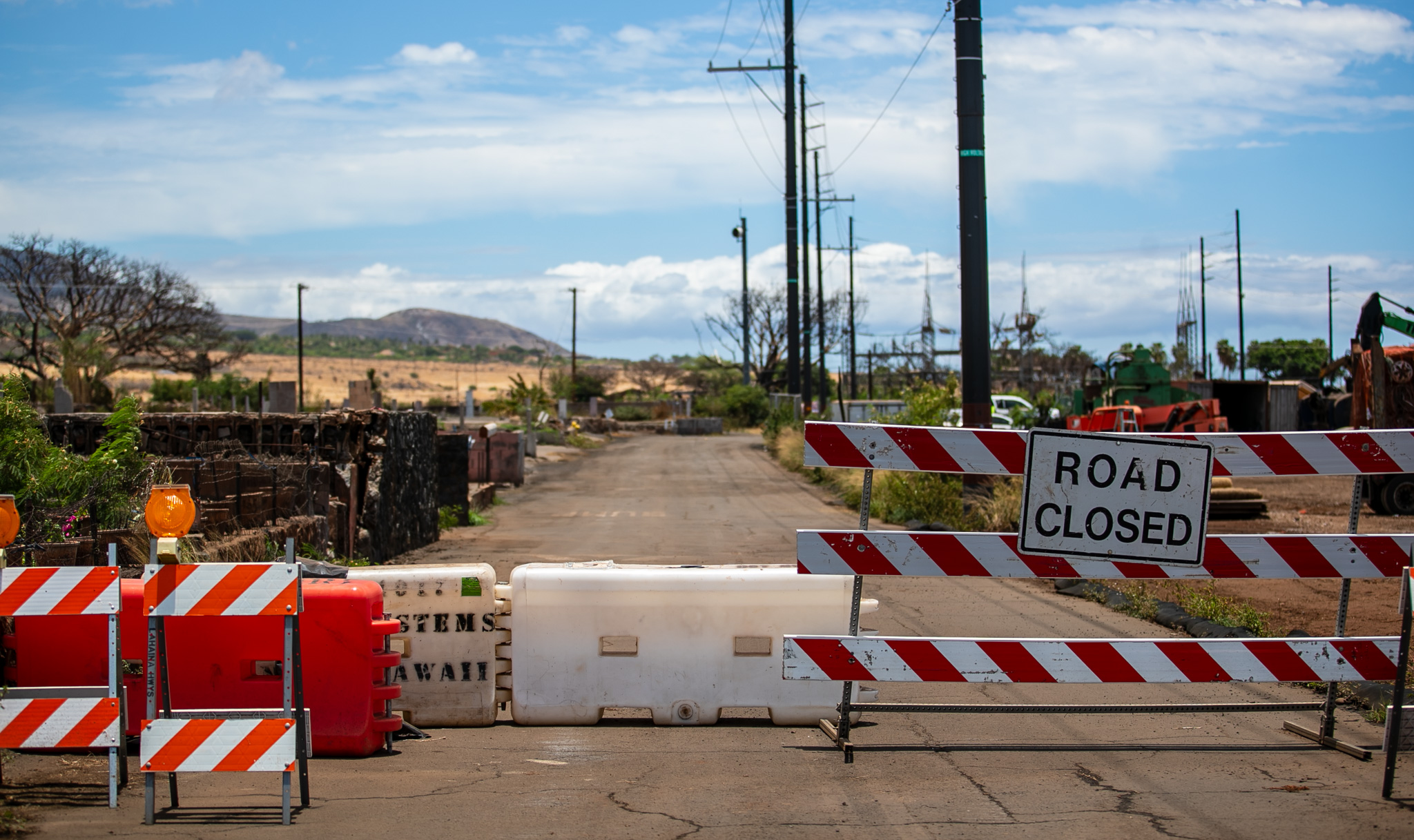 Kuhua Street near Aki Street on a day in early August has few signs of the death and destruction that occurred there on Aug. 8, 2023. (Nathan Eagle/Civil Beat/2024)