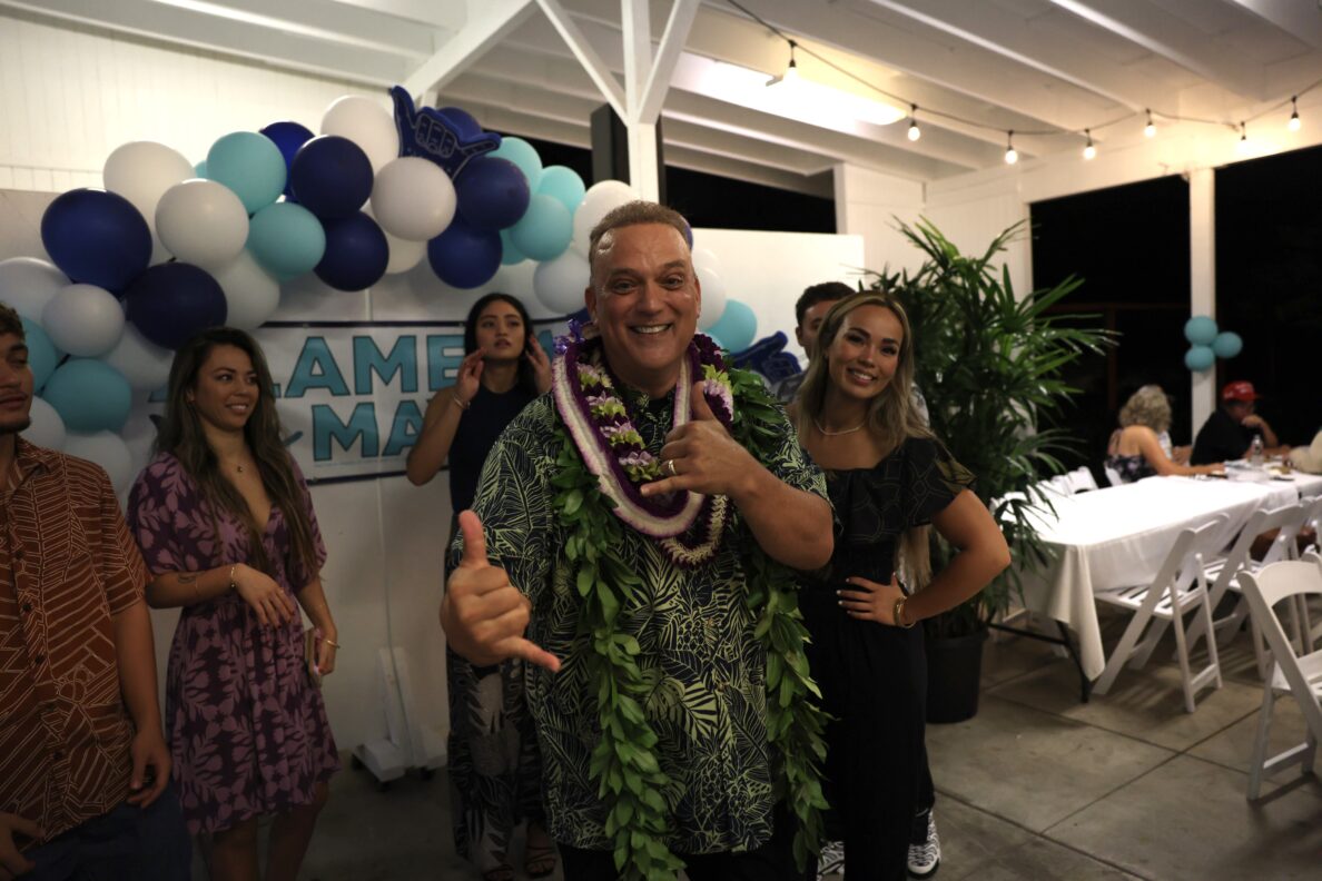 Big Island candidate for mayor Kimo Alameda celebrates at his campaign gathering in Hilo. Alameda held a sizable lead over incumbent Mayor Mitch Roth in initial election returns. (Cody Yamaguchi/Civil Beat/2024)