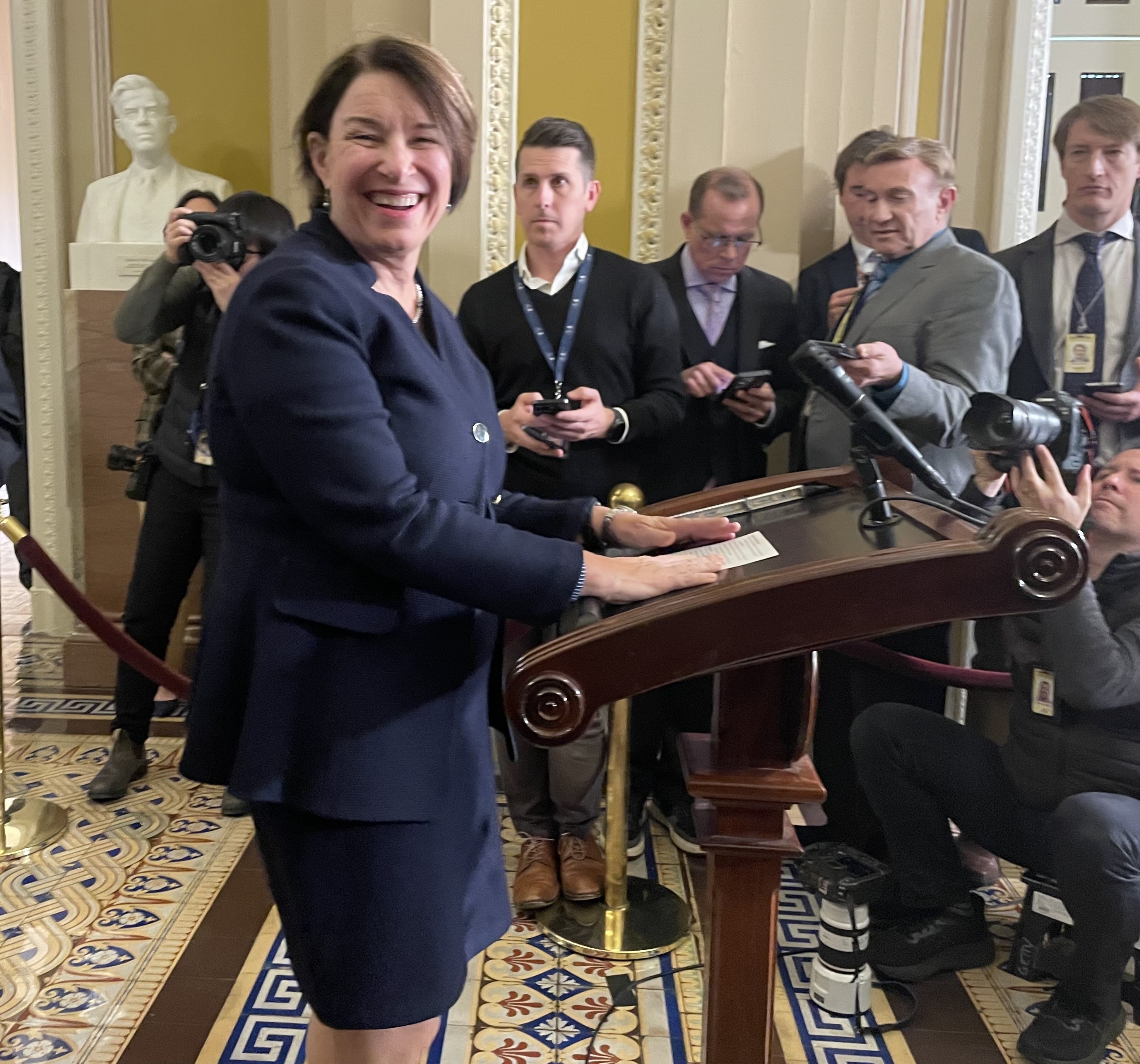 Sen. Amy Klobuchar, D-Minn., talks to reporters on Tuesday, Dec. 3, 2024, after she was elected as chair of Senate Democrats' Steering and Policy Committee, the No. 3 leadership post. (Photo by Ariana Figueroa/States Newsroom)
