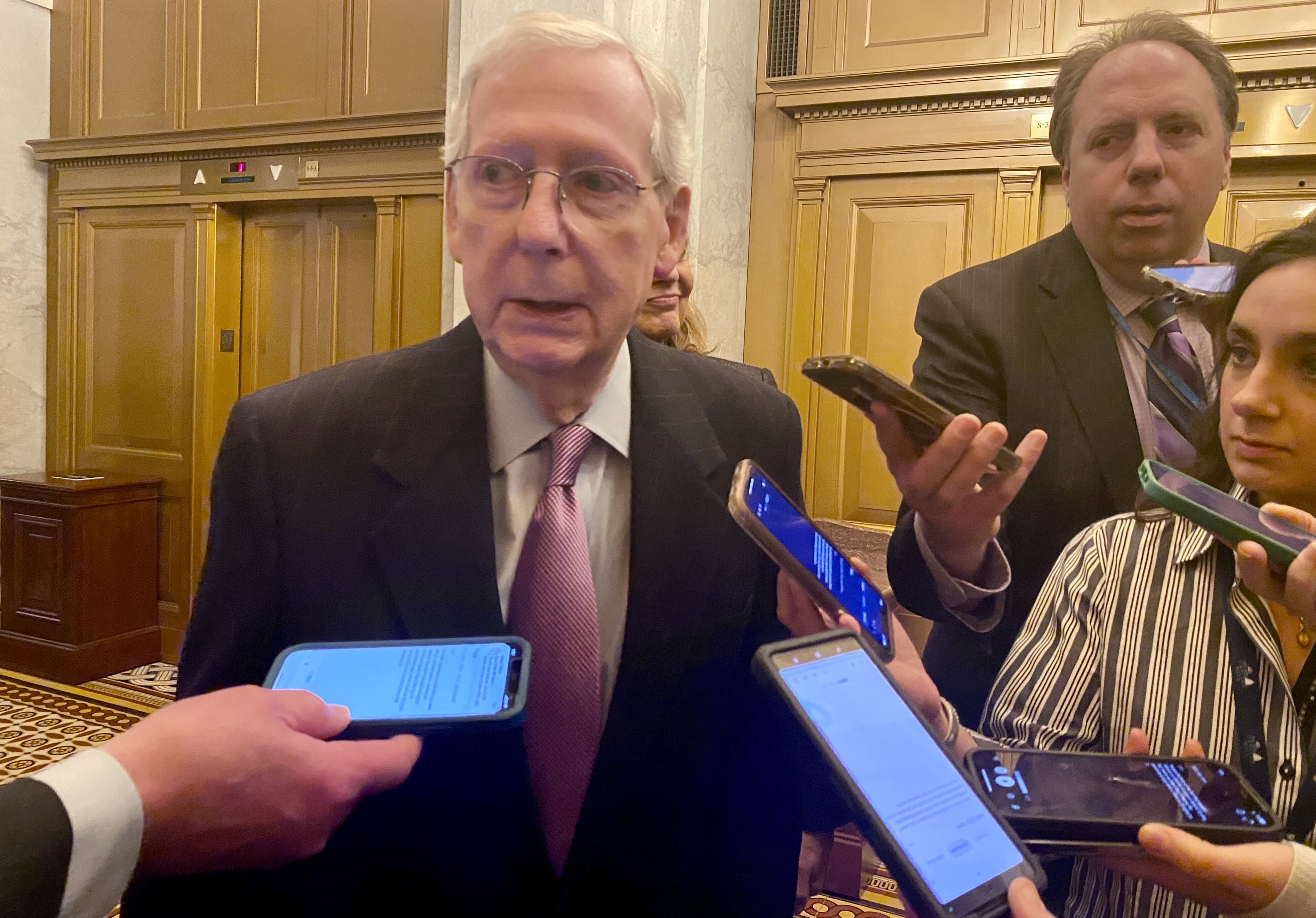 Senate Minority Leader Mitch McConnell, a Kentucky Republican, speaks with reporters inside the U.S. Capitol after returning from a meeting at the White House on Tuesday, Feb. 27, 2024. (Photo by Jennifer Shutt/States Newsroom)