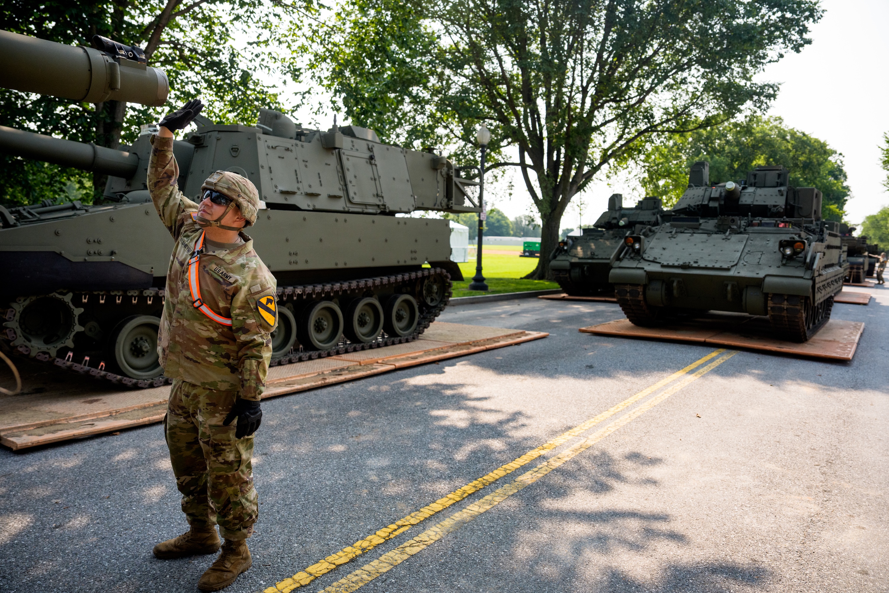 U.S. Army soldiers work on an assortment of M1 Alpha a3 Abrams tanks, stryker armored vehicles, and M2 Bradley fighting vehicles at West Potomac Park along the Potomac River on June 11, 2025 in Washington, D.C. Tanks and other heavy military equipment have arrived in the nation's capital for a military parade in honor of the U.S. Army's 250th anniversary, which coincides with President Donald Trump's birthday and Flag Day. (Photo by Andrew Harnik/Getty Images)