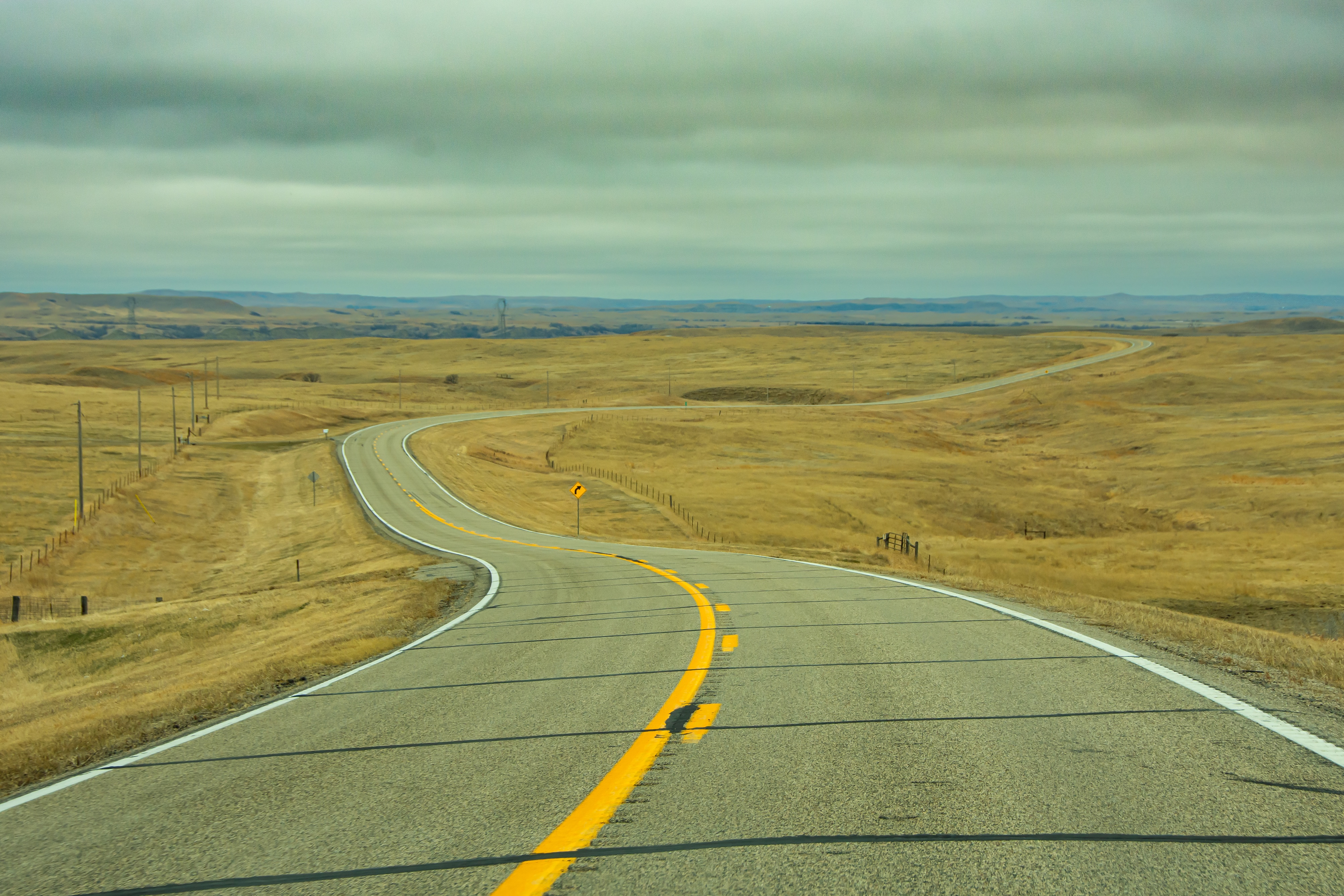 A ribbon of highway stretching to the horizon in North Dakota. (Photo by Getty Images)