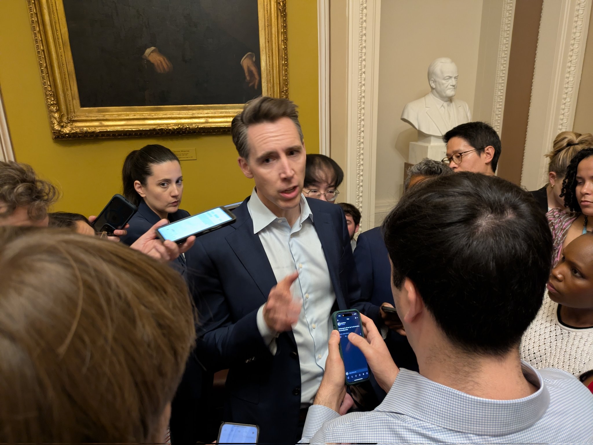 U.S. Sen. Josh Hawley, R-Mo., talks to reporters at the U.S. Capitol on Saturday, June 28, 2025. Hawley said he will vote for the budget reconciliation measure. (Photo by Ashley Murray/States Newsroom)