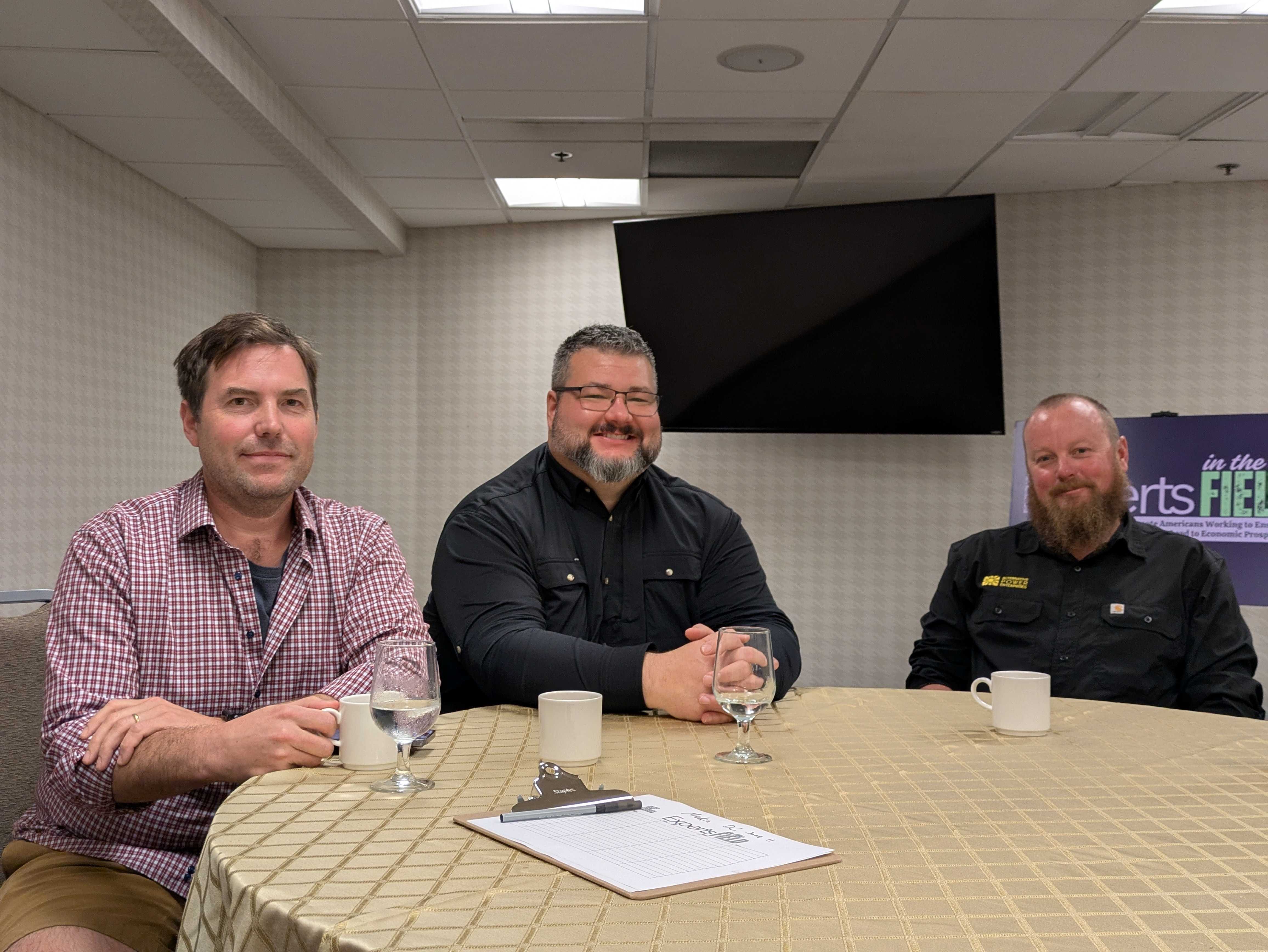 From left to right, Chase Christie, development director for Alaska Solar LLC, Josh Craft, managing partner of Wasilla, Alaska-based Crafty Energy LLC, and Josh Shipley, owner of Alternative Power Enterprises in Ridgeway, Colorado, at the Holiday Inn Express on C Street SW in Washington, D.C., on Wednesday, June 11, 2025, after meeting with U.S. senators about preserving clean energy tax credits in the Republican budget reconciliation bill. (Ashley Murray/States Newsroom)
