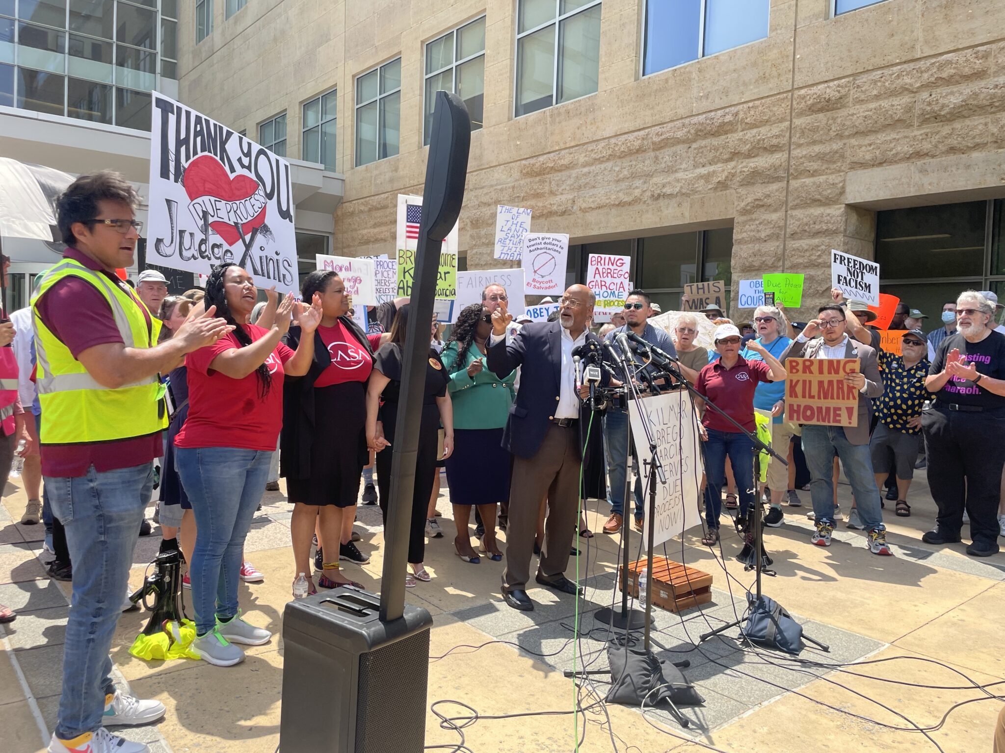 Maryland Democratic U.S. Rep. Glenn Ivey, who represents the district where Kilmar Abrego Garcia and his wife live, led the chant “bring him home” outside the U.S. District Court for the District of Maryland shortly before a hearing in Abrego Garcia’s case on Friday, May 16, 2025. (Photo by Ariana Figueroa/States Newsroom)