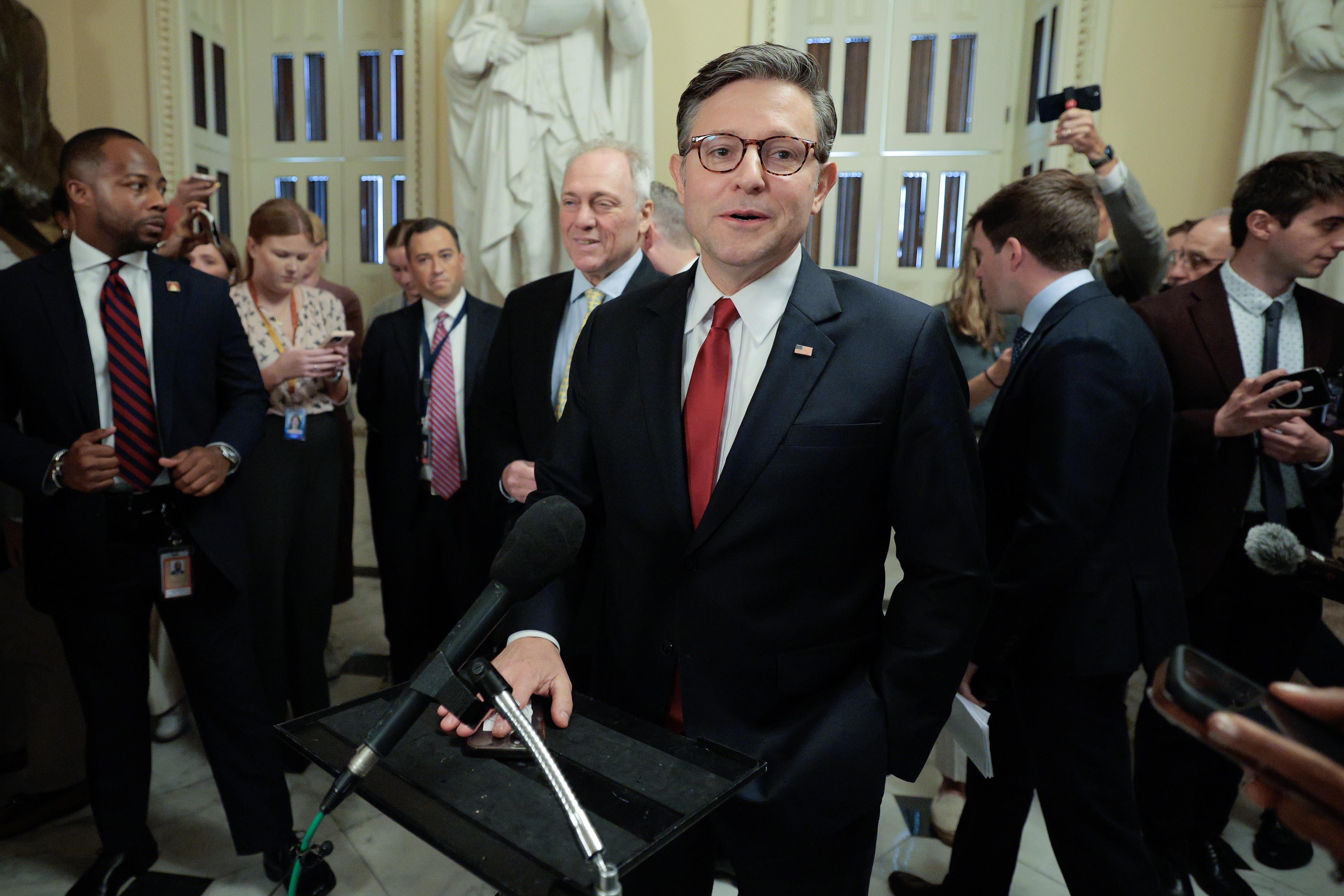 Speaker of the House Mike Johnson, R-La., talks with reporters before heading to the House chamber for a procedural vote on the "One, Big, Beautiful Bill Act" at the U.S. Capitol on July 2, 2025 in Washington, D.C. (Photo by Chip Somodevilla/Getty Images)