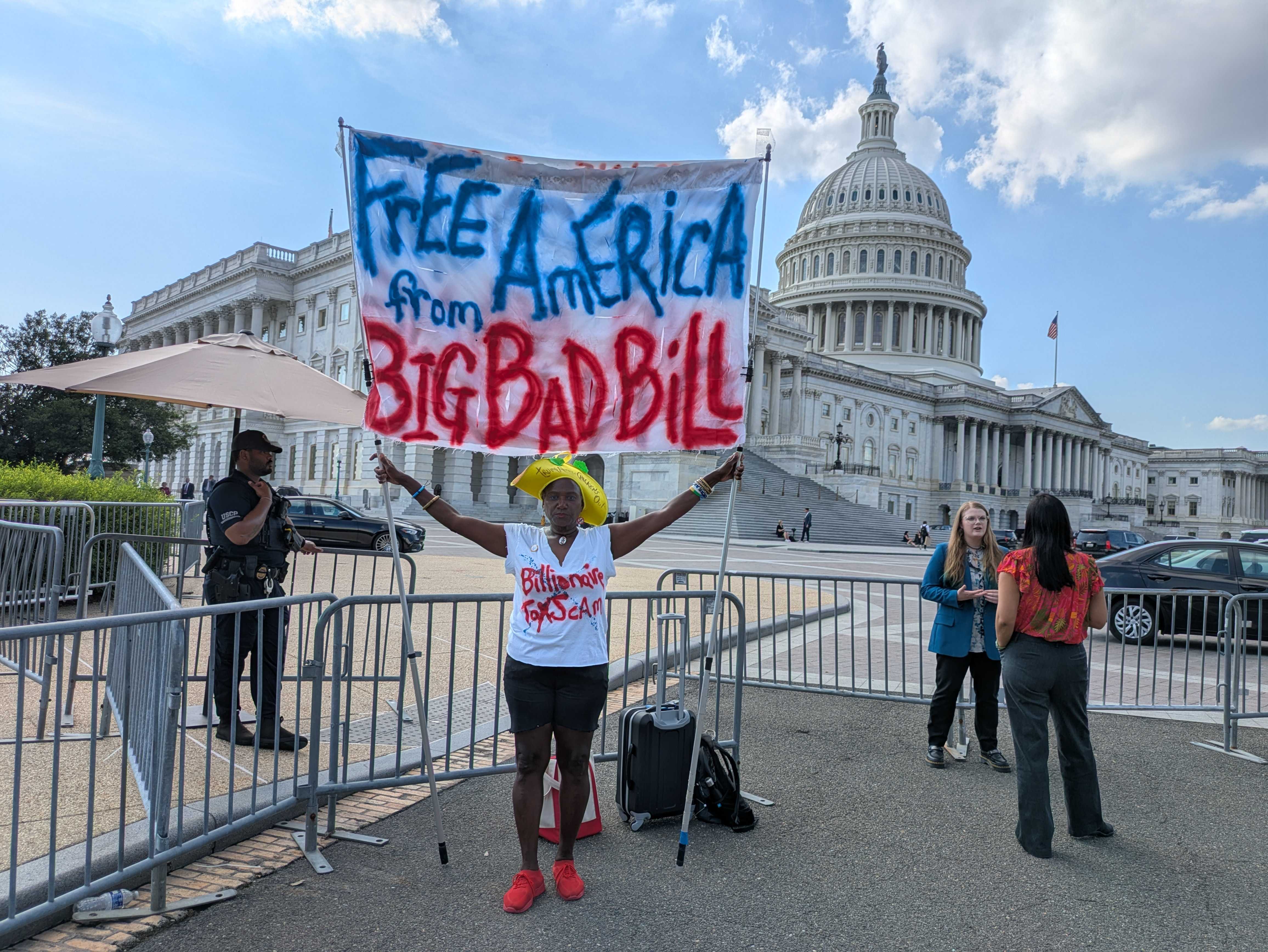 Nadine Seiler, 60, of Waldorf, Maryland, protested against the "big beautiful bill" outside the U.S. Capitol on Wednesday, July 2, 2025, as House Republicans were stalled in whipping enough votes for floor passage of the massive budget reconciliation bill. (Photo by Ashley Murray/States Newsroom)