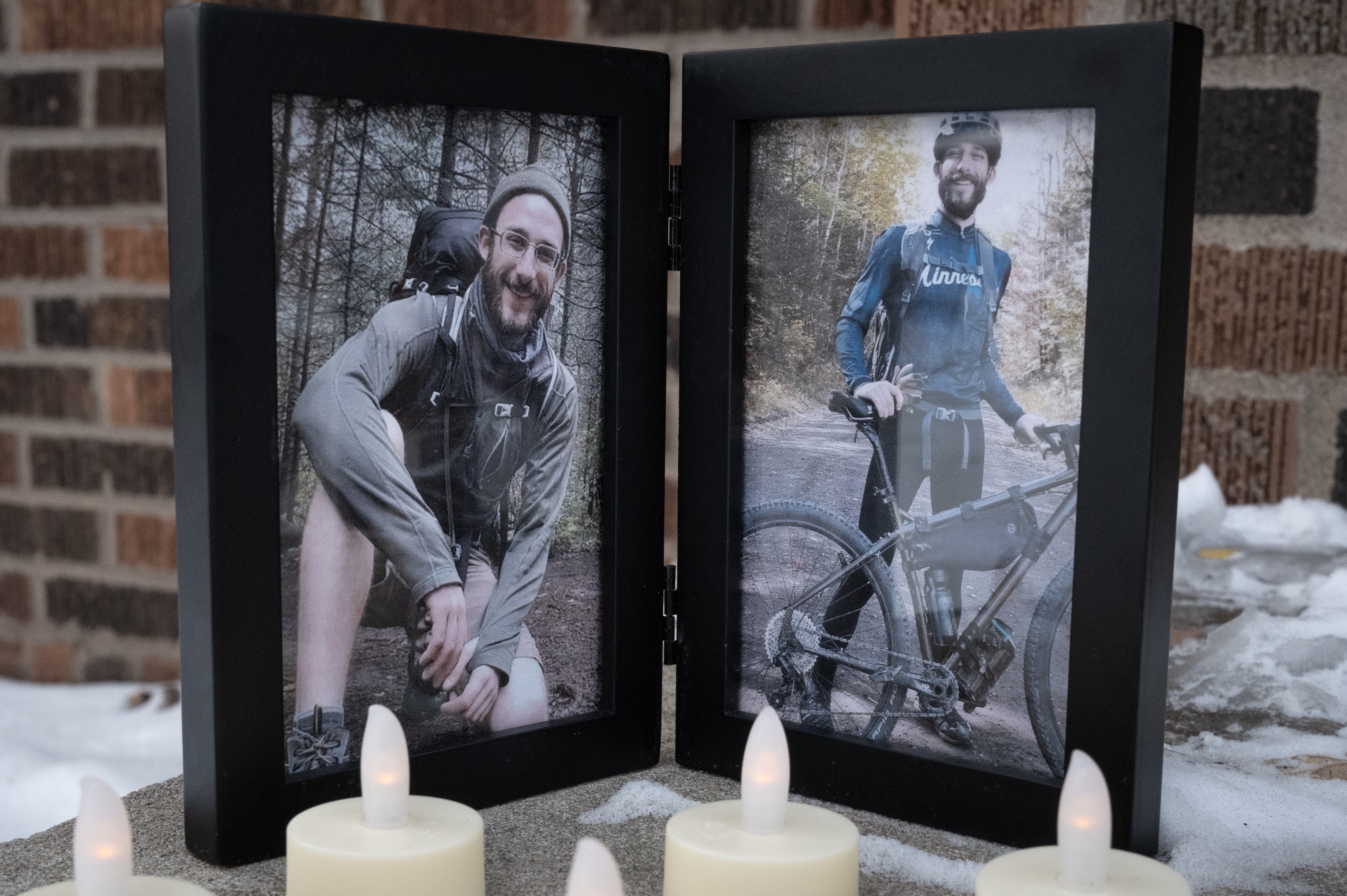 Pictures of Alex Pretti sit in front of his home on Jan. 26, 2026 in Minneapolis, Minnesota. Pretti, an ICU nurse at a VA medical center, died Jan. 25, after being shot multiple times during a brief altercation with Border Patrol agents in Minneapolis. (Photo by Scott Olson/Getty Images)