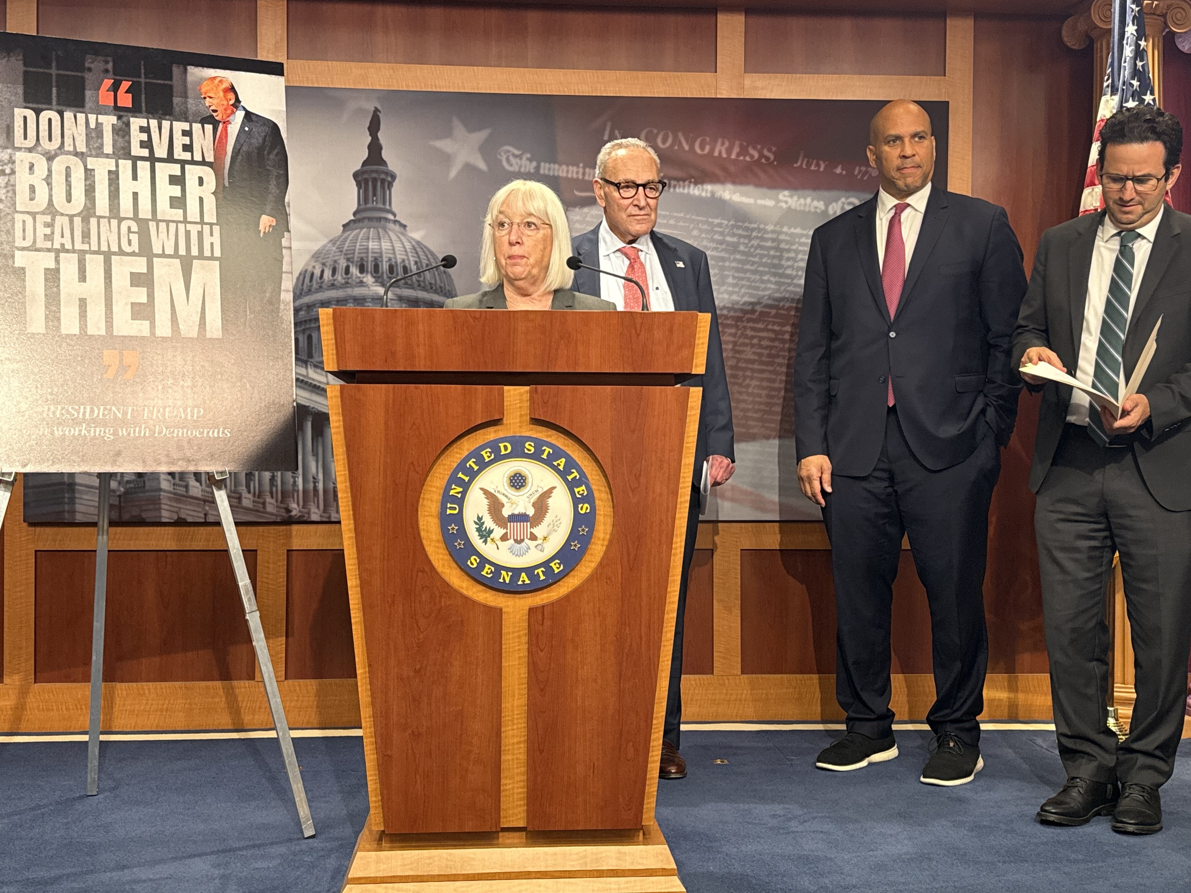 Washington state Democratic U.S. Sen. Patty Murray, speaks with reporters inside the Capitol building in Washington, D.C., on Friday, Sept. 19, 2025. Also pictured, from left to right, are Senate Minority Leader Chuck Schumer, D-N.Y.; New Jersey Democratic Sen. Cory Booker and Hawaii Democratic Sen. Brian Schatz. (Photo by Jennifer Shutt/States Newsroom)