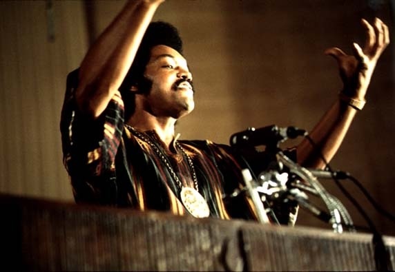 The Rev. Jesse L. Jackson Sr. speaks on a radio broadcast from the headquarters of Operation PUSH at its annual convention in July 1973. (Photo by John H. White/National Archives and Records Administration)