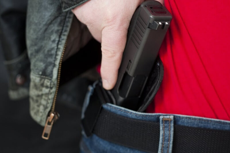 Judge says state cannot ban gun owners from carrying in bars, near demonstrations Judge says state cannot ban gun owners from carrying in bars, near demonstrations