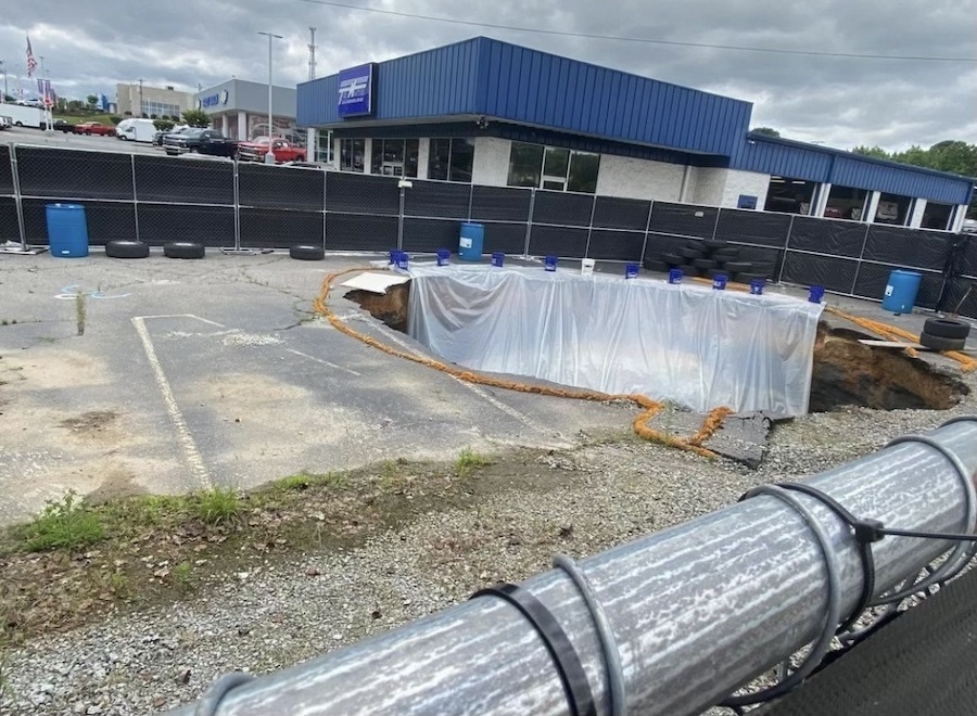 Coal ash sinkhole expands in Mooresville, contaminating stream while legal dispute delays cleanup Coal ash sinkhole expands in Mooresville, contaminating stream while legal dispute delays cleanup