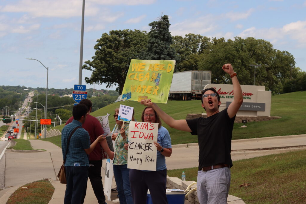 Iowans protest water quality issues outside of event with Gov. Reynolds Iowans protest water quality issues outside of event with Gov. Reynolds