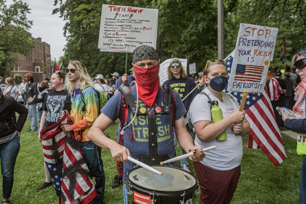 ‘Down with deportations!’ shouted by thousands at Detroit’s Clark Park amid minor confrontations ‘Down with deportations!’ shouted by thousands at Detroit’s Clark Park amid minor confrontations