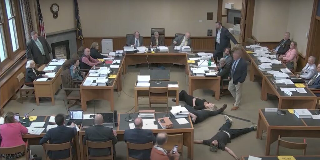 Demonstrators arrested after attempting to interrupt New Hampshire lawmakers’ budget negotiations Demonstrators arrested after attempting to interrupt New Hampshire lawmakers’ budget negotiations