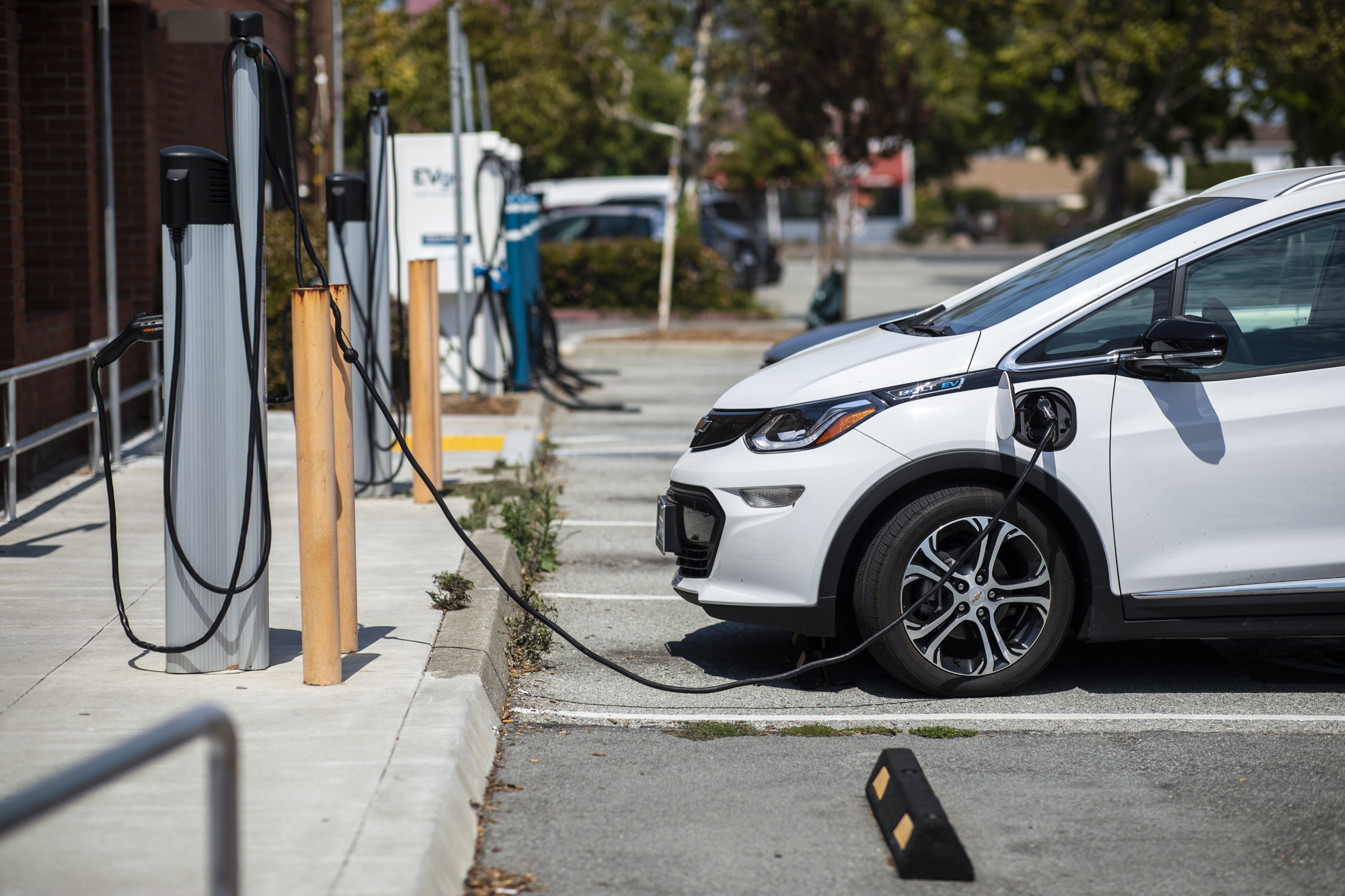 Here we go again: California prepares to battle Trump over environmental policies An electric vehicle recharges at an electric vehicle charging station in Milbrae on July 29, 2022. Photo by Martin do Nascimento, CalMatters