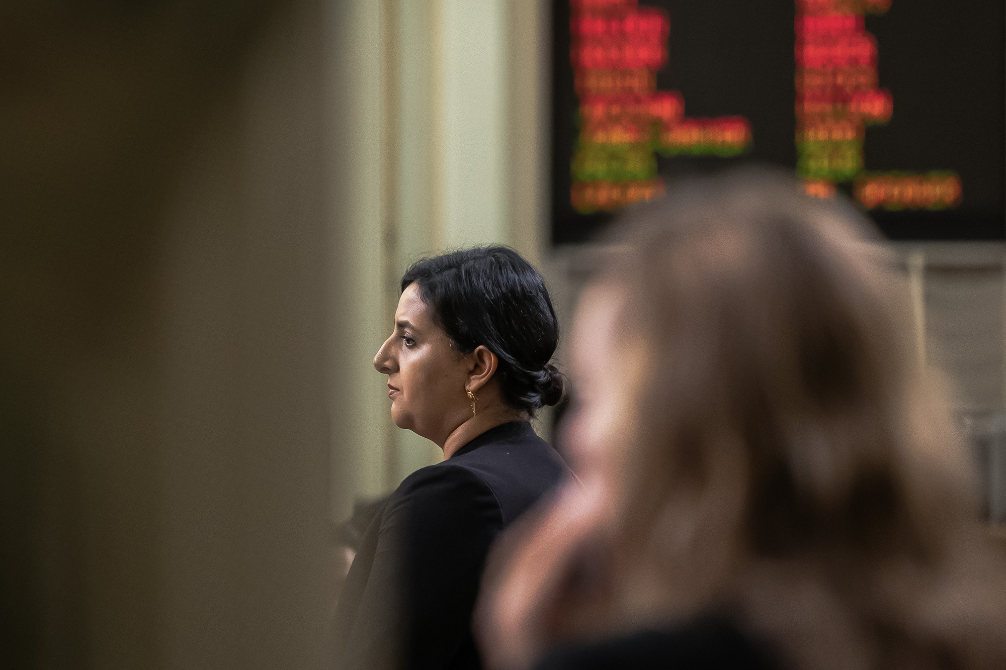 Hate crimes rise against Indian Americans in California, deepening a divide between Hindus and Sikhs An assemblymember on the assembly floor with a floor vote screen in the background.
