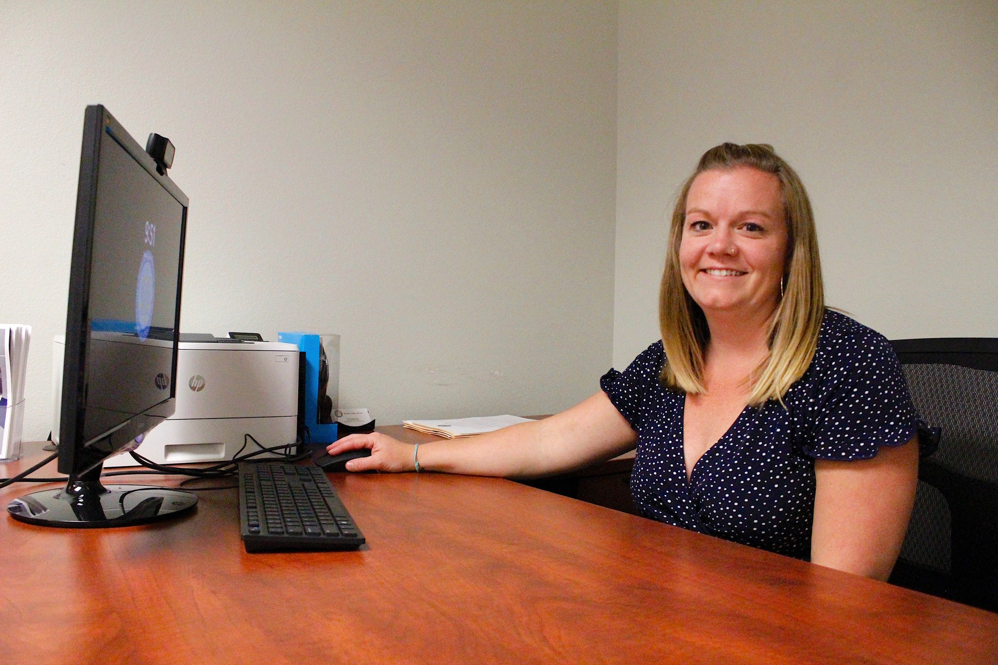 No lawyer? A new program in Casper could help you navigate the court system. A woman sits at a desk with a computer