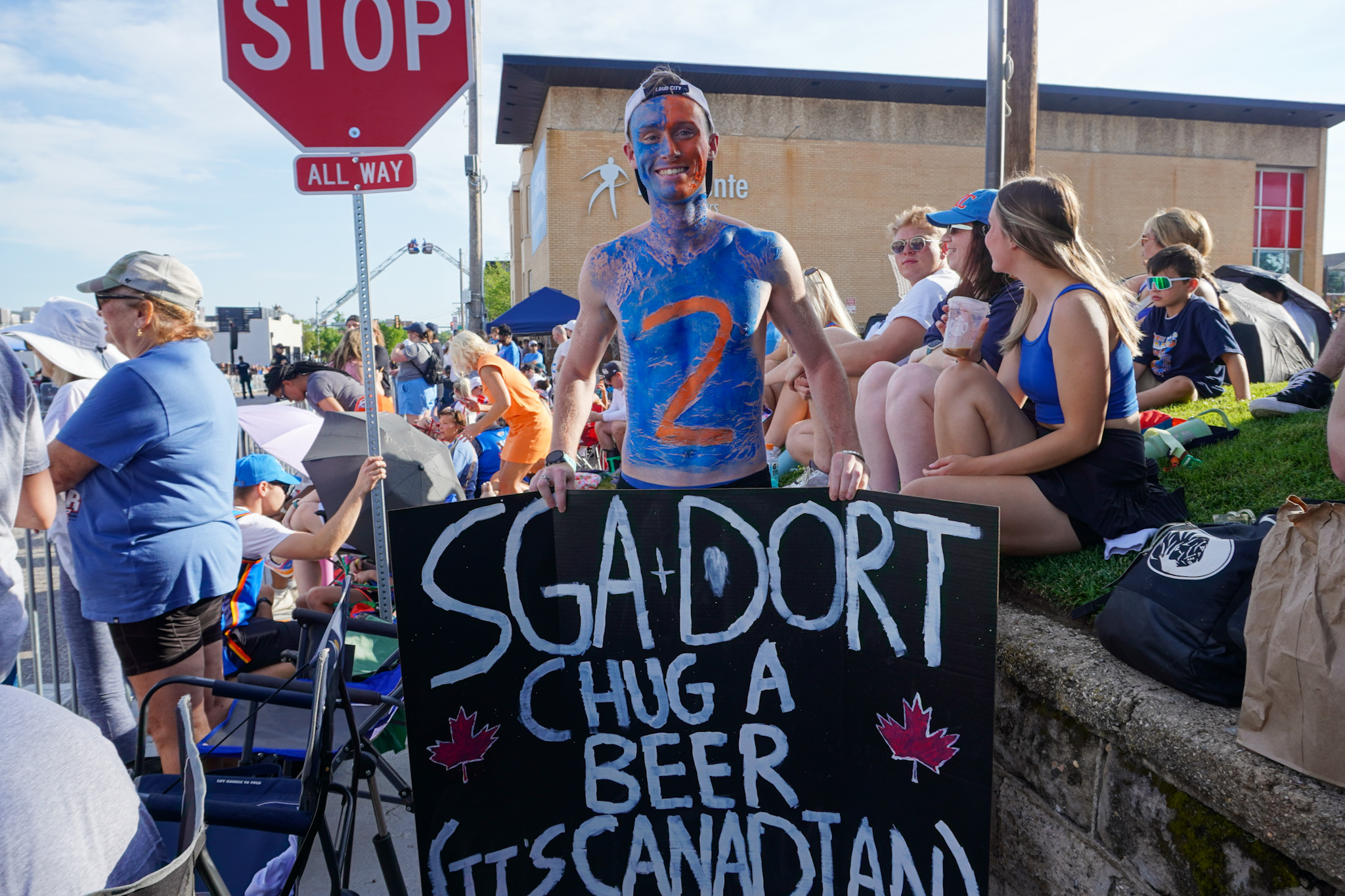 Nearly 500,000 line parade route to celebrate Oklahoma City Thunder’s championship victory Thunder fan in body paint with sign