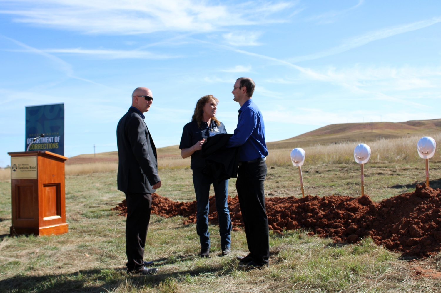 State: Bowing to local zoning in prison dispute ‘would be an absurd result’ From left, Pennington County Sheriff Brian Mueller, South Dakota Secretary of Corrections Kellie Wasko and Ryan Brunner, senior policy adviser and director of legislative relations for Gov. Kristi Noem, participate in a groundbreaking ceremony for a women's prison Oct. 16, 2023, in Rapid City. (Seth Tupper/South Dakota Searchlight)