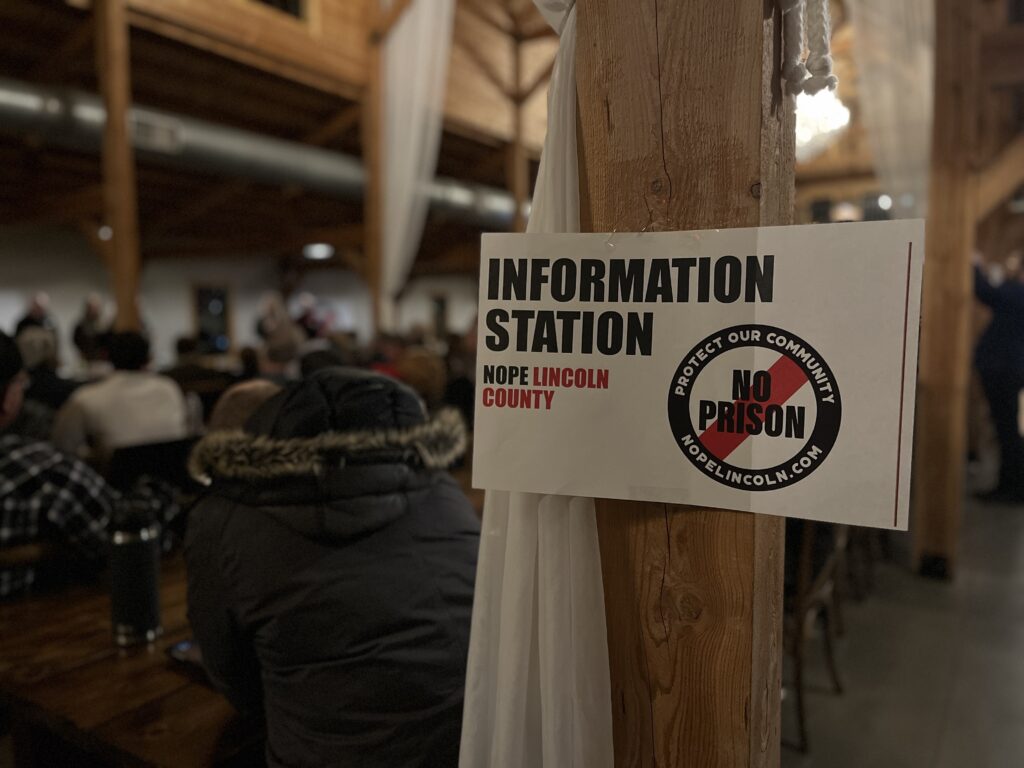 State: Bowing to local zoning in prison dispute ‘would be an absurd result’ A sign opposing the proposed prison site in Lincoln County, SD, as seen at a community meeting in Harrisburg, SD on Dec. 21, 2023. (Josh Haiar/South Dakota Searchlight)