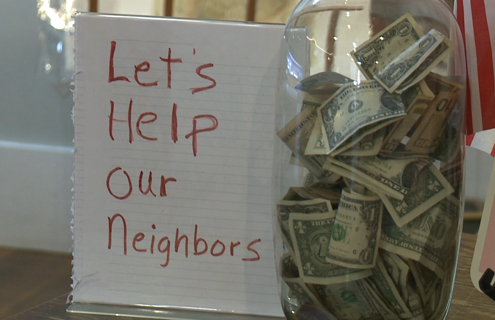 A town saved a nonprofit office to help laid-off immigrant workers find jobs. Now it’s all in peril. Muddy Mo's Coffee House put out a tip jar this spring to fundraise money to keep the Lutheran Social Services Yankton office open. (Courtesy of Dakota News Now)