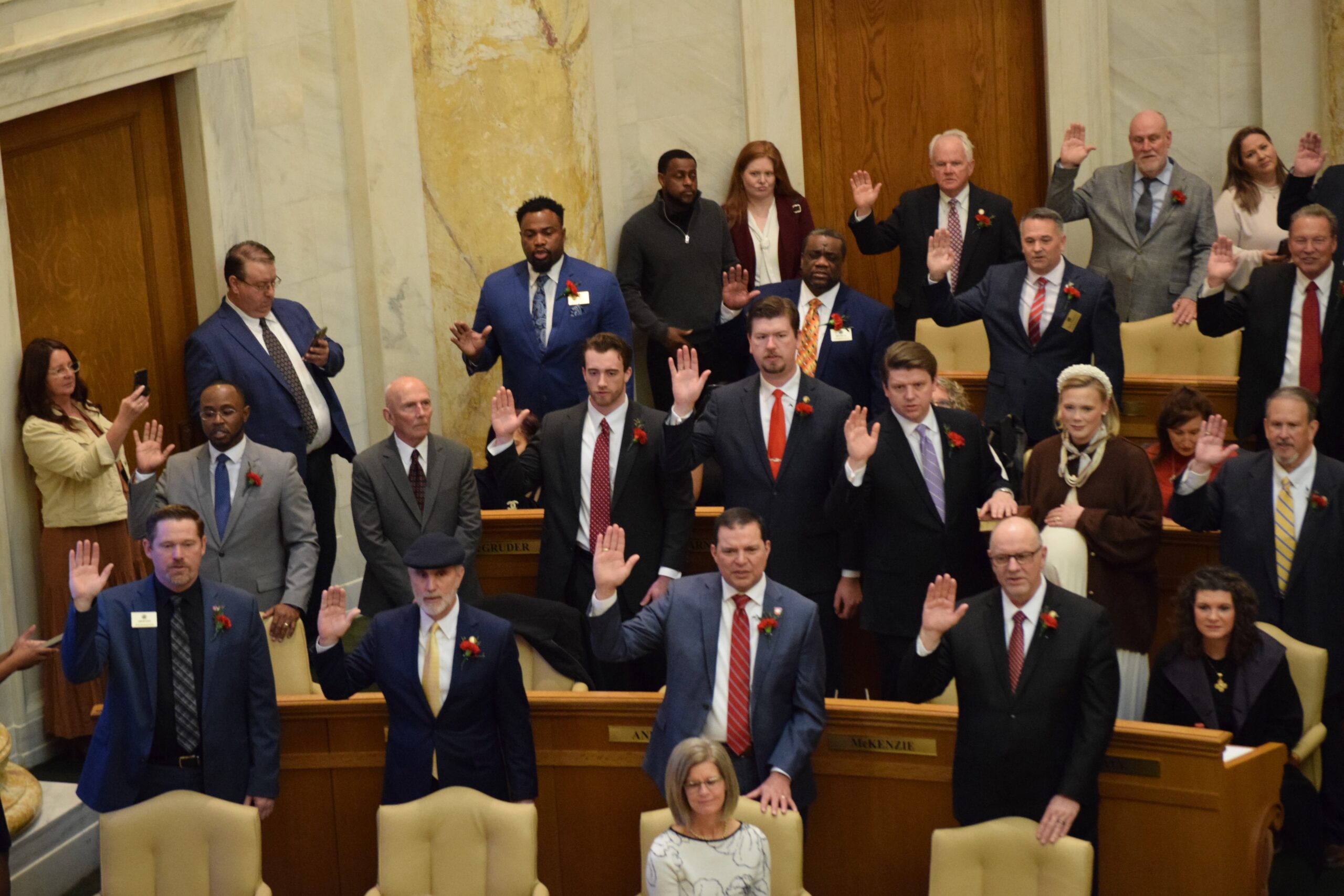 New House Speaker, new and reelected lawmakers ring in Arkansas’ 2025 legislative session Members of the Arkansas House of Representatives stand for the National Anthem during the start of the 95th General Assembly