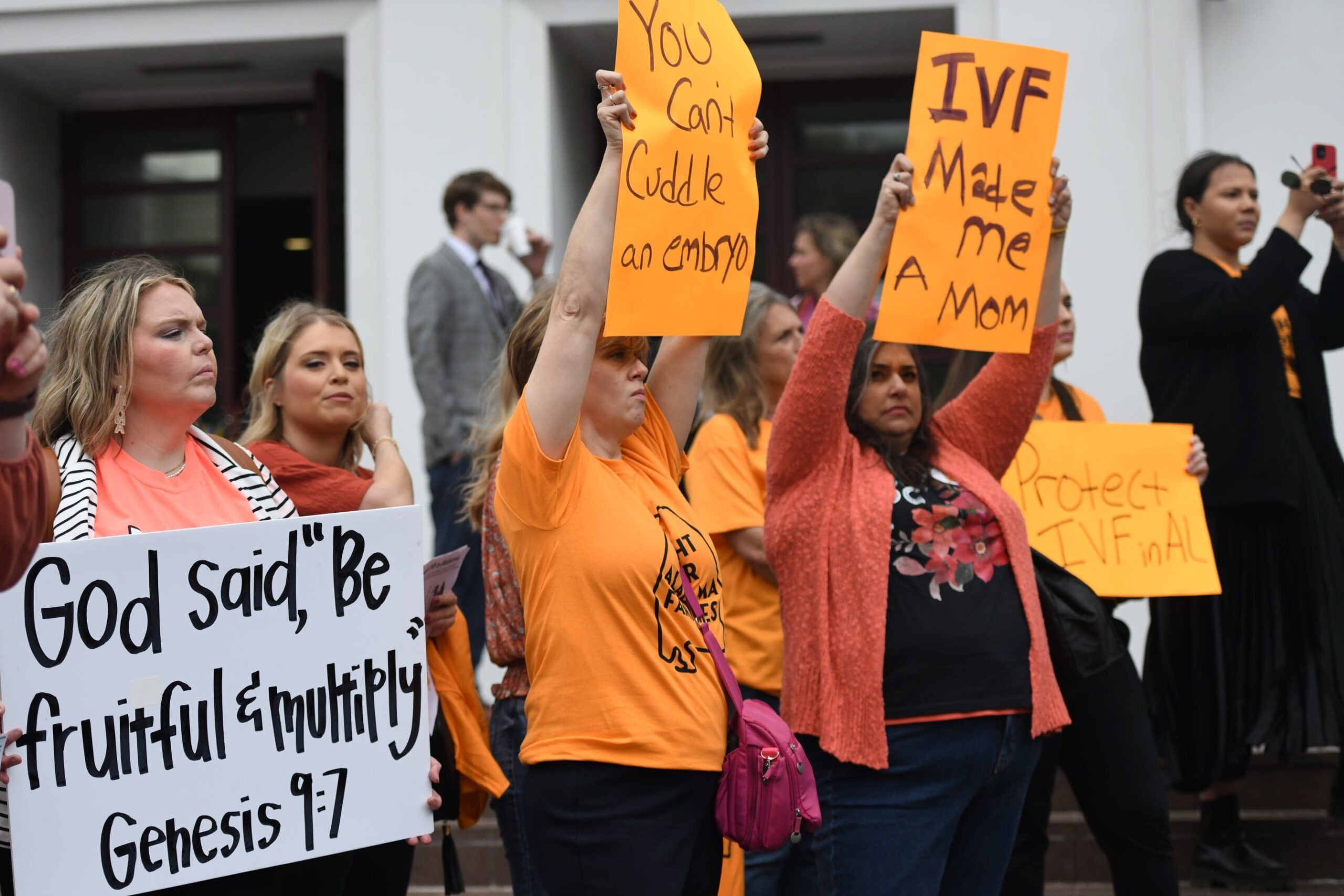 Reproductive health newsmakers in 2024: pregnant women, judges, anti-abortion activists Protestors holding up signs