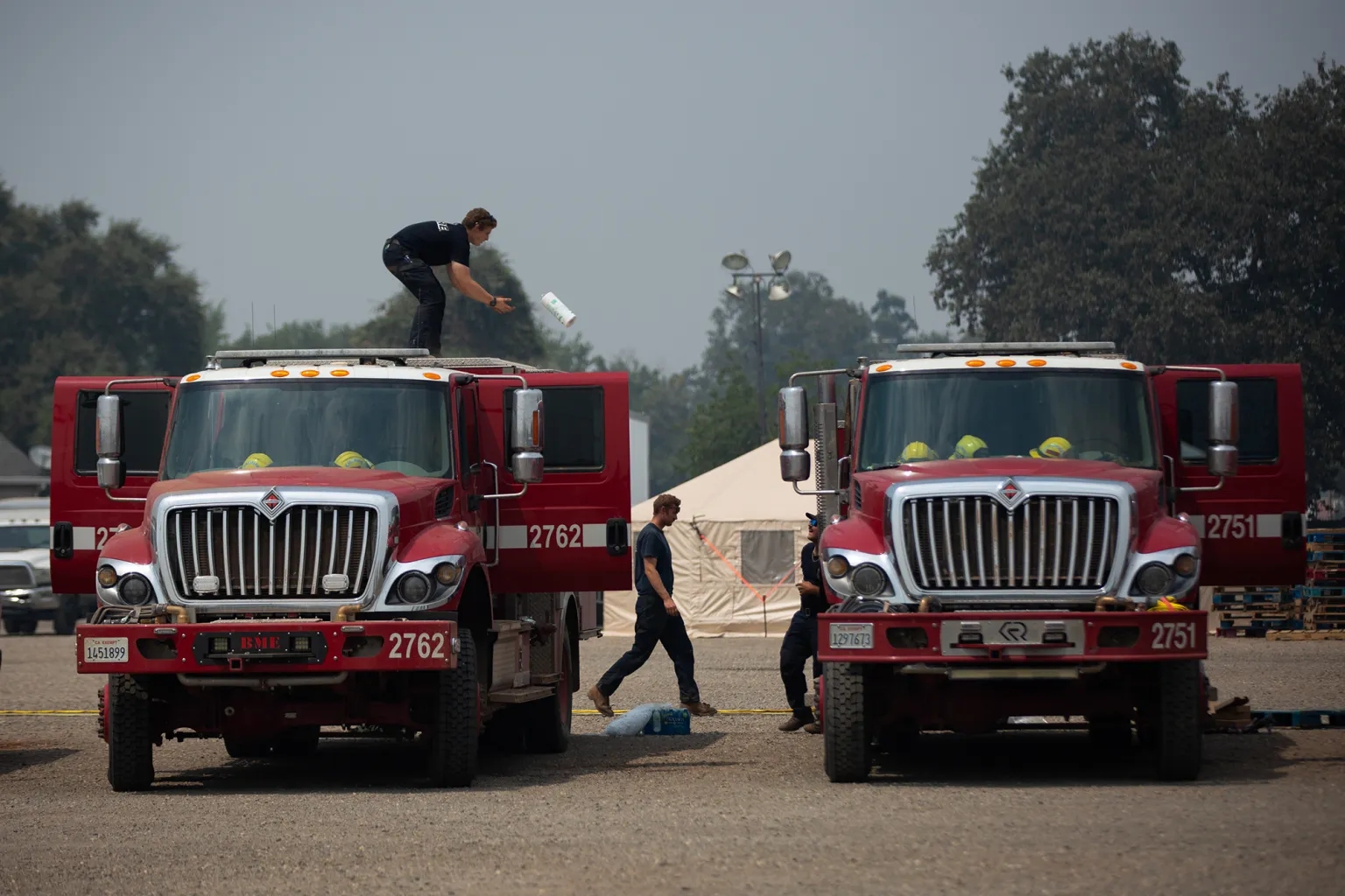 California battles onslaught of wildfires with help from mutual aid Firefighters at the Park Fire command post in Chico on Aug. 2, 2024, after a 24-hour shift. (Photo by Florence Middleton/CalMatters)