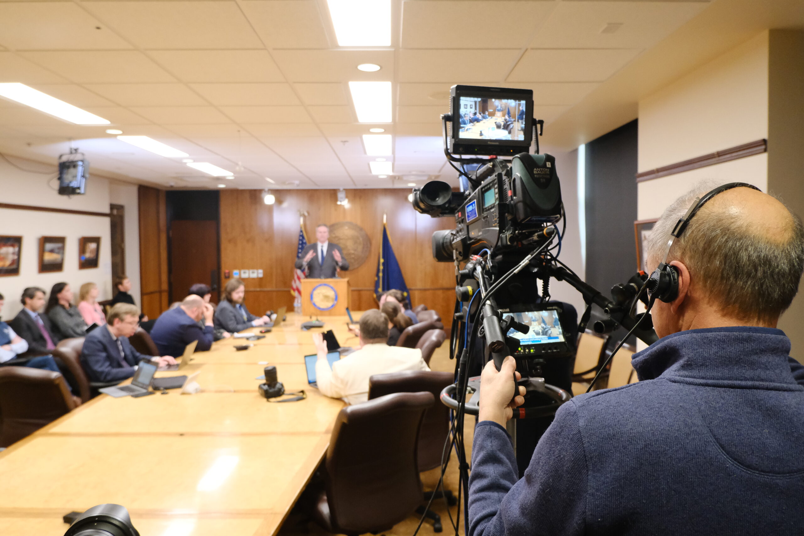 Behind the cameras: Gavel Alaska broadcasts the business of state government to Alaskans Michael Penn, a Gavel production technician broadcasts a live press conference with Gov. Mike Dunleavy following his second veto of education funding legislation (Photo by Corinne Smith/Alaska Beacon)