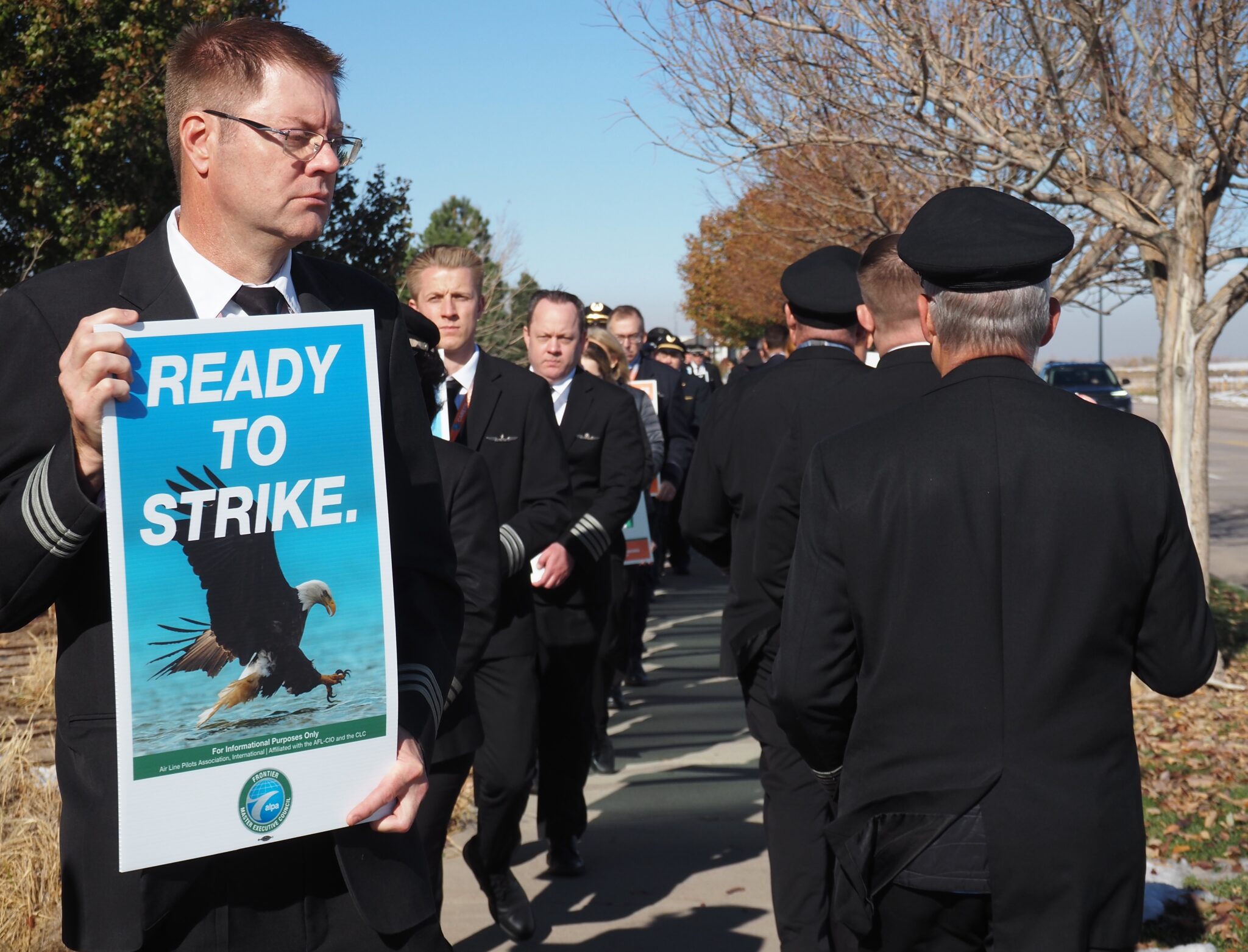 Frontier Airline pilots picket outside headquarters, seek market-aligned contract Frontier Airlines pilots picket outside headquarters, seek market-aligned contract