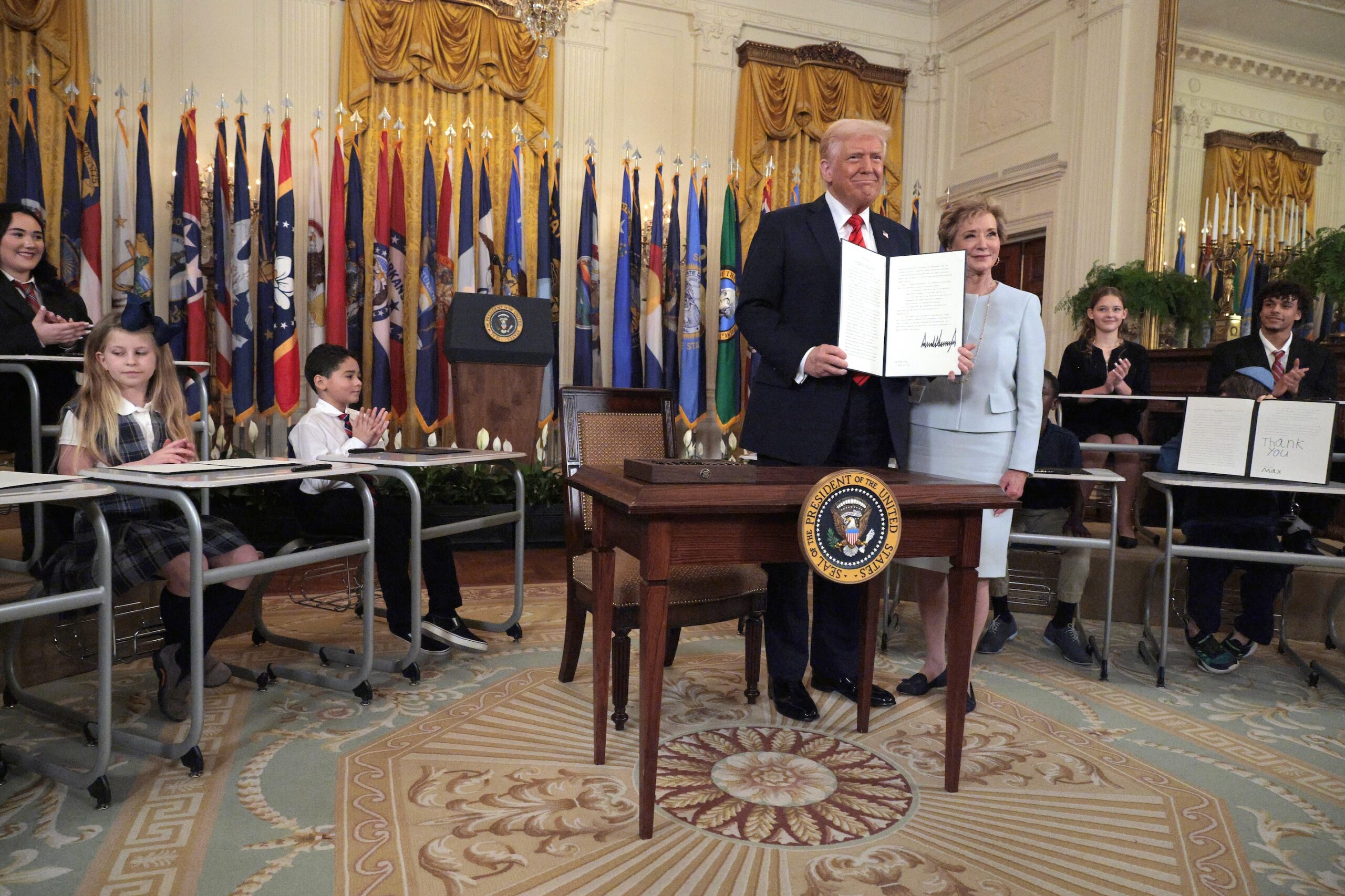 Trump administration unfreezes research grants in deal with Brown University U.S. President Donald Trump stands with Secretary of Education Linda McMahon after signing an executive order to reduce the size and scope of the Education Department during a ceremony in the East Room of the White House on March 20, 2025 in Washington, D.C. (Photo by Chip Somodevilla/Getty Images)