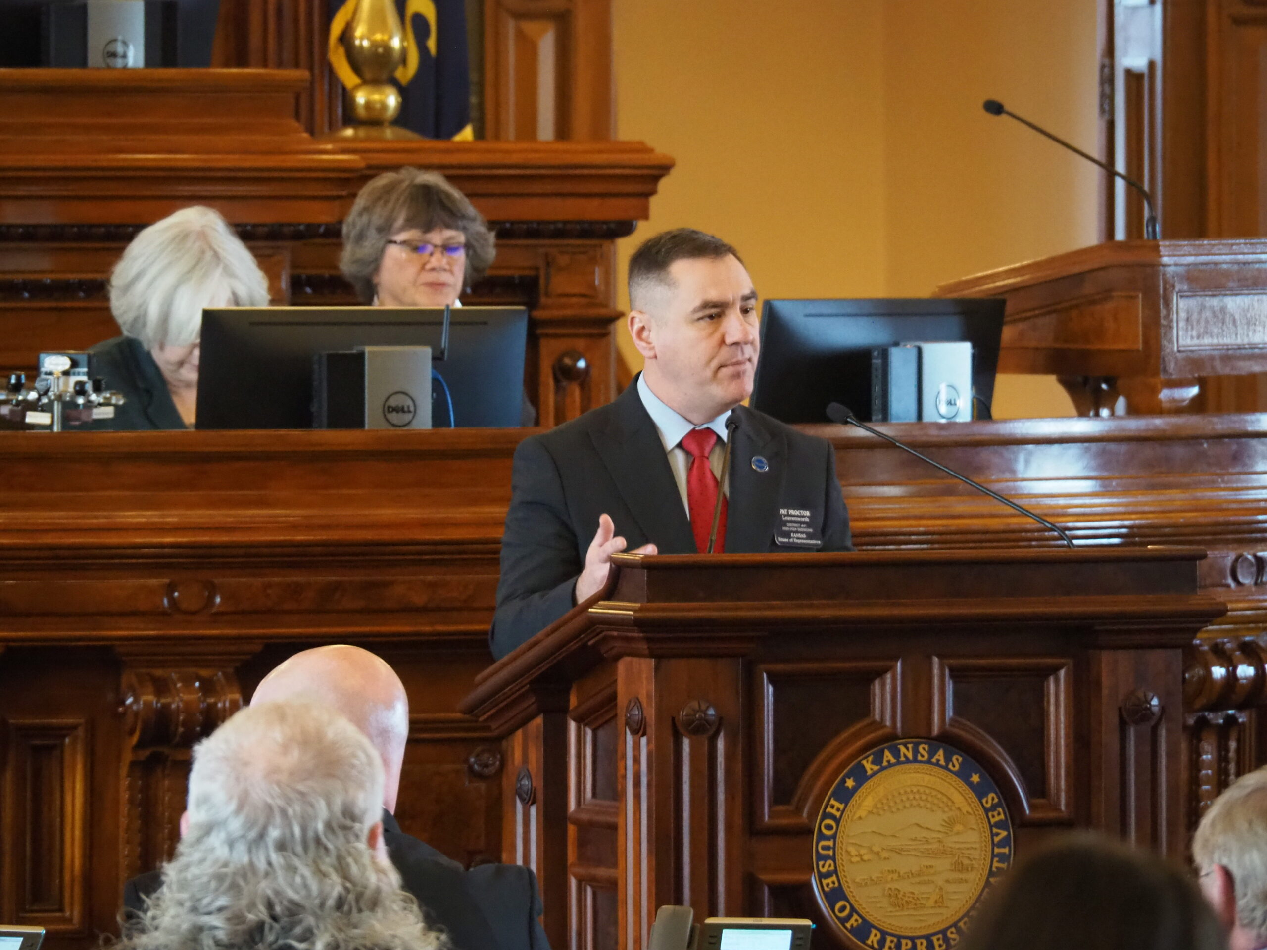 In Kansas, a trifecta of xenophobia does nothing to help the humanitarian crisis 700 miles away Rep. Pat Proctor, R-Leavenworth, successfully carried a nonbinding resolution asking Gov. Laura Kelly to consider deploying Kansas National Guard troops and Kansas law enforcement officers to the U.S.-Mexico border to show solidarity with Texas Gov. Greg Abbott's fight with the Biden administration to secure the border. (Tim Carpenter/Kansas Reflector)