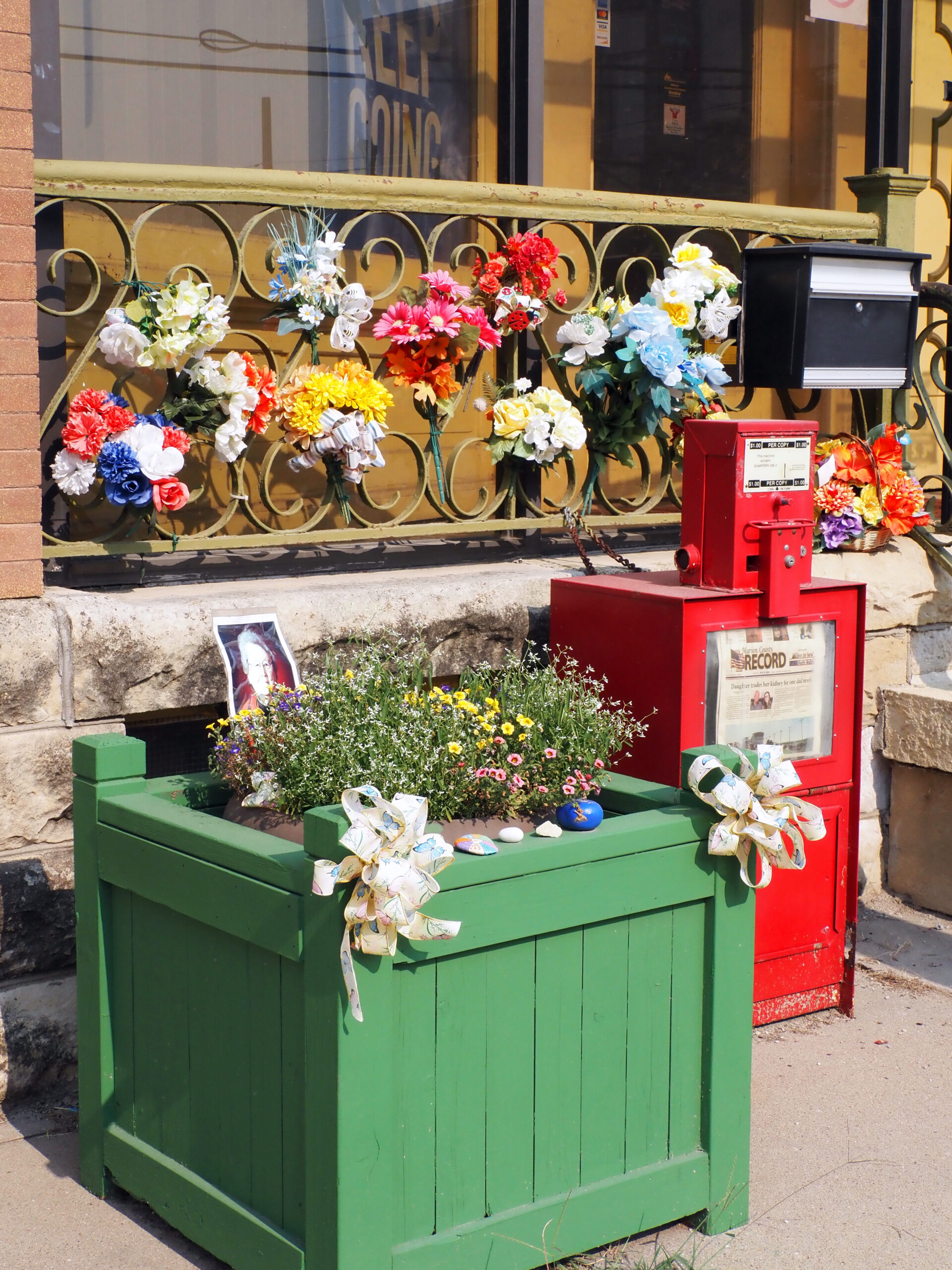 After Kansas newspaper raid, journalists remain defiant in battle for accountability A tribute to Joan Meyer, the 98-year-old co-owner of the Marion County Record who died a day after police raided her home, appears July 25, 2024, outside the newspaper office