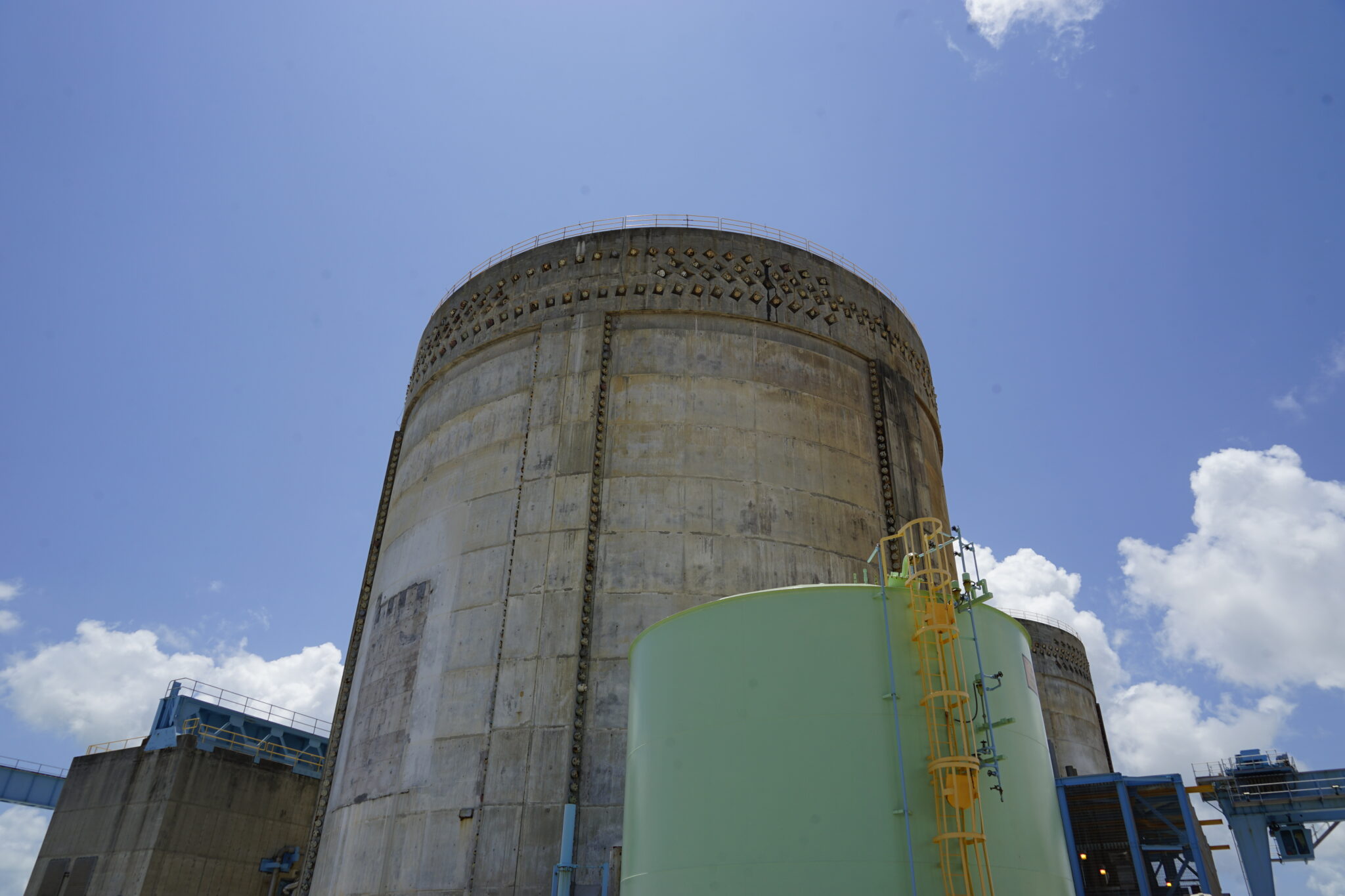 Nuclear power could solve US electricity needs. But at what cost? A cooling tower at Florida Power & Light’s Turkey Point nuclear facility