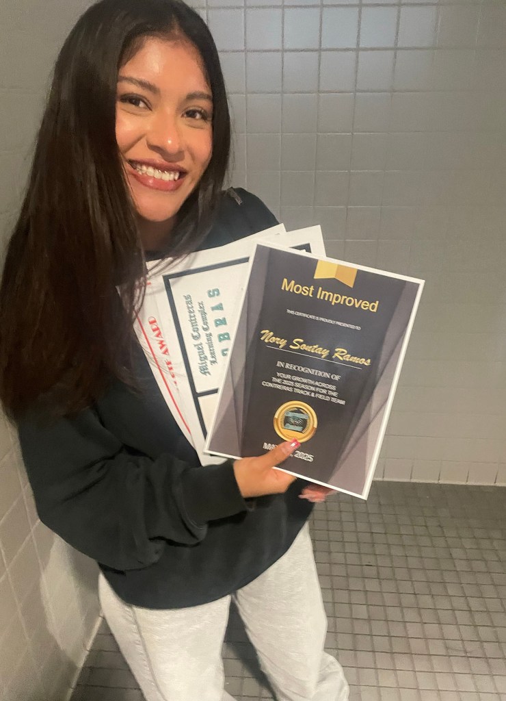 She was a rising senior on the honor roll. ICE just upended her life. Nory Sontay Ramos holds a stack of school certificates, including one labeled “Most Improved,” and smiles for the camera.