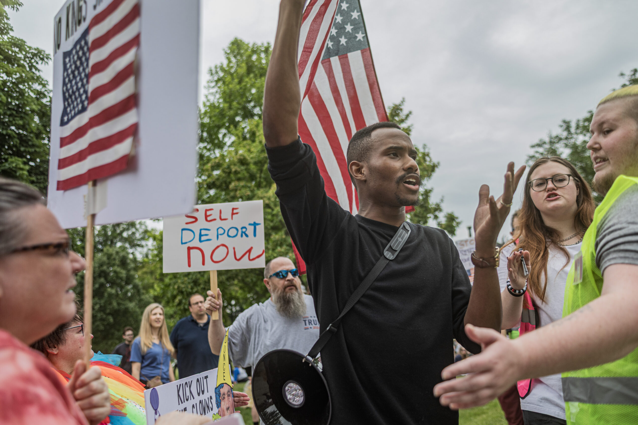 ‘Down with deportations!’ shouted by thousands at Detroit’s Clark Park amid minor confrontations ‘Down with deportations!’ shouted by thousands at Detroit’s Clark Park amid minor confrontations