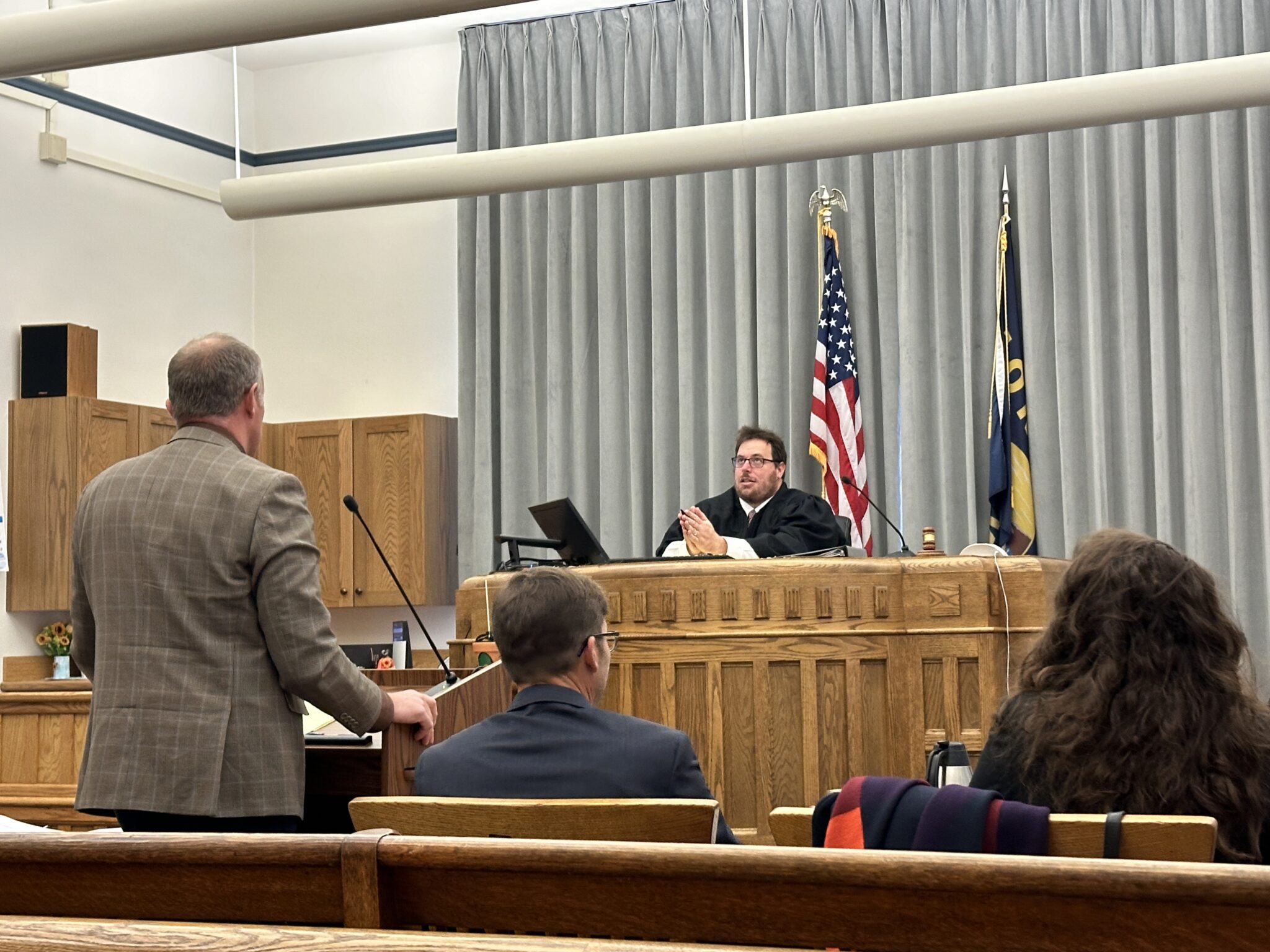 Judge hears arguments over whether new abortion clinic regulations should remain blocked Montana Assistant Attorney General Thane Johnson (left) is asked questions by Judge Christopher Abbott during a hearing on No. 8, 2024. (Photo by Blair Miller, Daily Montanan)