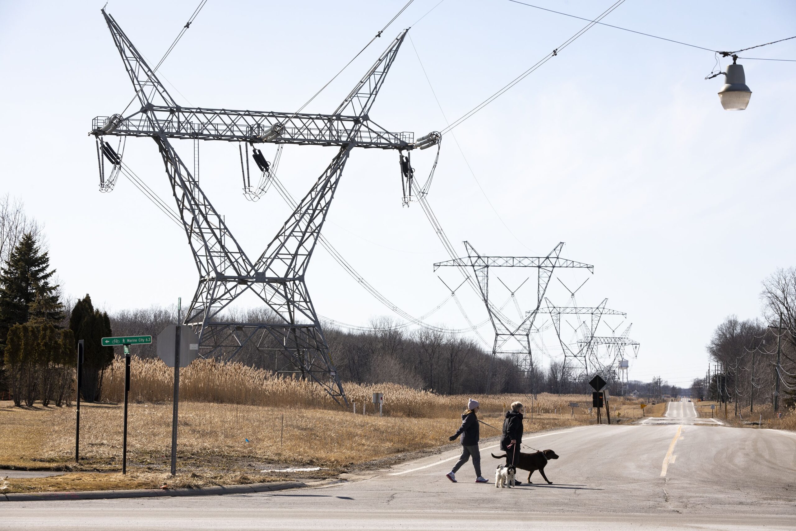 Don’t boil over summer electric bills arrive. Use the power to shop for your electricity in Pa. Transmission towers that carry high-voltage electricity are shown on March 8, 2025, in East China Township, Michigan. Ontario, Canada Premier Doug Ford put a 25 percent tariff on electricity that the province provides to Michigan, Minnesota, and New York beginning March 10 as a response to the tariffs President Donald Trump imposed on goods from Canada. (Photo by Bill Pugliano/Getty Images)