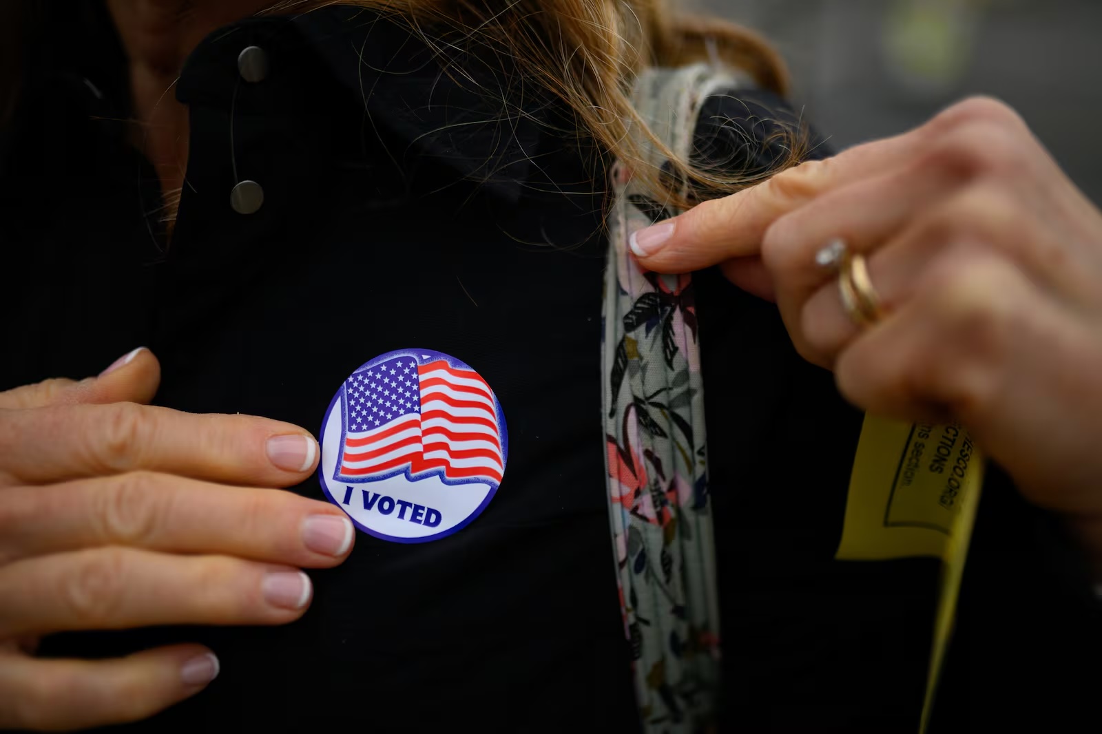What to know about the push for open primaries in Pennsylvania A voter puts on an "I Voted" sticker after dropping off her ballot in West Chester, Pennsylvania, on Nov. 5, 2024. (Kriston Jae Bethel for Votebeat)