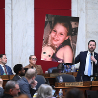 Del. Shawn Fluharty, D-Ohio, held up a poster of Raylee Browning, a child who died from abuse and neglect after her parents removed her from public school to homeschool her. Raylee’s Law would prevent parents from removing their child from school to homeschool them if a teacher has reported them for abuse. (Perry Bennett | West Virginia Legislative Photography)