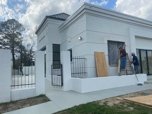 A building once housing the Jackson Women’s Health Organization — otherwise known as the Pink House for its iconic pink walls — was recently the only abortion clinic in the state of Mississippi and the heart of the Supreme Court case that overturned the federal right to abortion. Now its walls have been painted white and a new owner plans to turn it into a luxury consignment store. (Photo by Shalina Chatlani/States Newsroom)