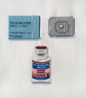 This cross-stitched image of abortion pills was not included in Katrina Majkut’s “Unconditional Care” exhibit at Lewis-Clark State College over concerns it would violate the Idaho No Public Funds for Abortion Act. (Katrina Majkut)