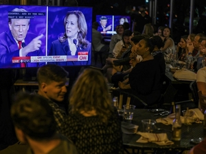 Former President Donald Trump and Vice President Kamala Harris debate for the first time during the presidential election campaign at The National Constitution Center on Sept. 10 in Philadelphia. A handful of issues and groups of voters in battleground states could decide the race. (Alex Wong/Getty Images)