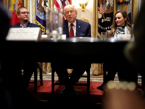 President Donald Trump participates in a roundtable discussion with farmers and lawmakers in the Cabinet Room of the White House on Dec. 8, 2025 in Washington, D.C. Left is Cordt Holub of Dysart, Iowa, and right is Meryl Kennedy of Monroe, Louisiana.(Photo by Alex Wong/Getty Images)