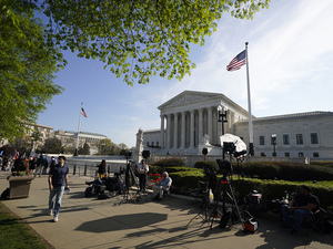 Members of the media set up outside the U.S. Supreme Court ahead of U.S. President Donald Trump's expected arrival on April 01, 2026 in Washington, DC. The Supreme Court is hearing oral arguments in Trump v. Barbara to determine if President Trump's executive order ending birthright citizenship is constitutional. According to historians and the Court, this is the first time a sitting president has attended oral arguments at the nation's highest court. (Photo by Al Drago/Getty Images)