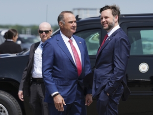 Missouri Governor Mike Kehoe, left, welcomes U.S. Vice President JD Vance as he arrives at Kansas City International Airport, May 18, 2026 in Kansas City, Missouri. Vance on his visit pitched voters on keeping Republicans in Congress. (Photo by Eric Lee-Pool/Getty Images)